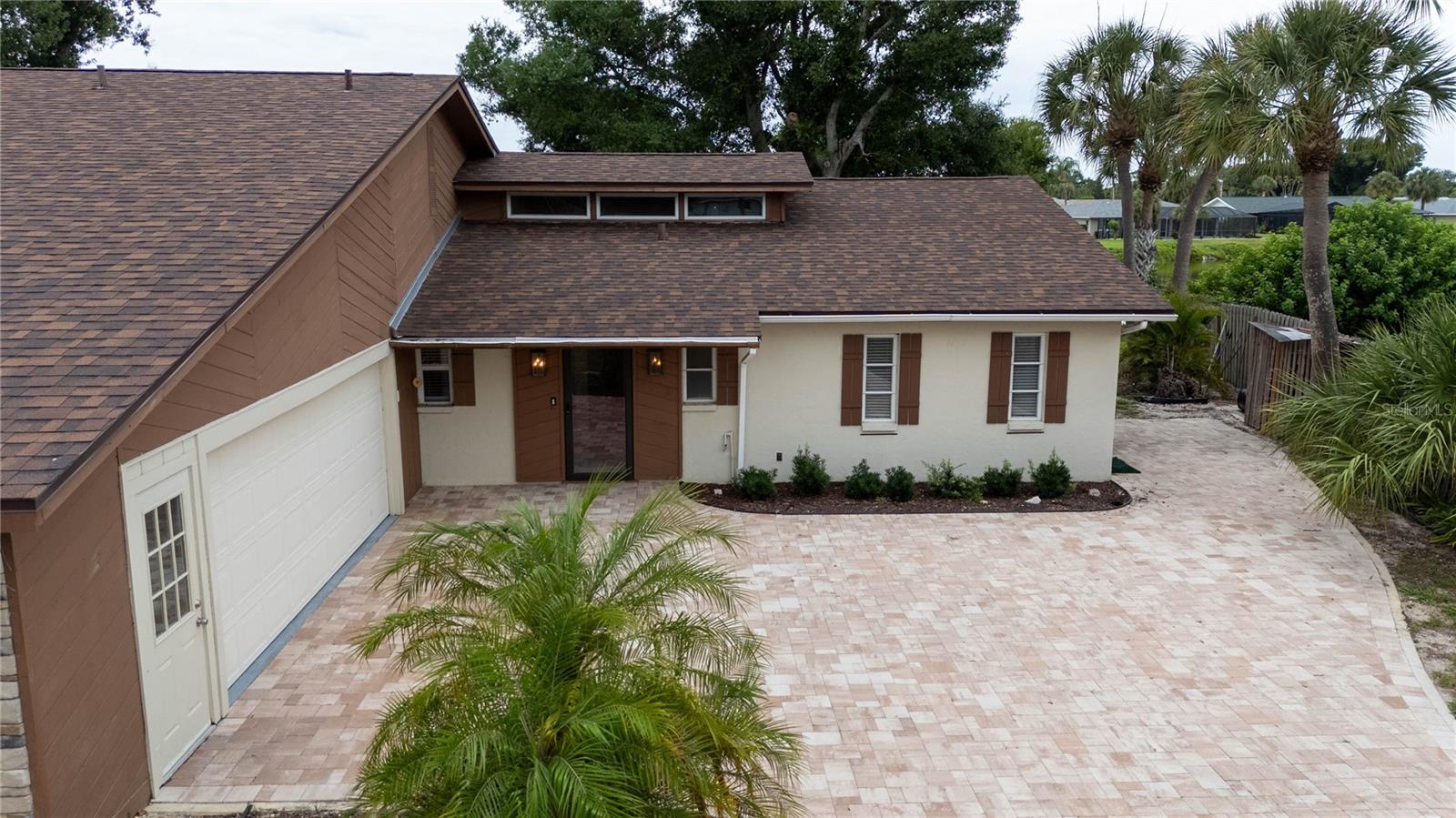 This 3-bedroom, 2-bath home at the end of a quiet cul-de-sac in Pinebrook South offers 2,118 square feet of living space with a lake view from the rear, a brand-new roof, and one feature that doesn't appear anywhere else in the neighborhood: a loft accessed by a spiral staircase.
The loft — 15 x 9 feet, carpeted, private — works equally well as a home office, creative studio, or reading retreat. It's the kind of space that changes how a home functions on a daily basis.
The main floor is open and efficiently laid out, with cathedral ceilings, luxury vinyl flooring, a split bedroom plan, and granite countertops in the kitchen and baths. The primary suite is oversized at nearly 24 x 13 feet with a walk-in closet and en suite bath. The two additional bedrooms each offer built-in closet storage.
Out back, an enclosed lanai and open outdoor area face the lake directly. Eagles, osprey, hawks, and roseate spoonbills are regular visitors. No CDD fee.
Pinebrook South is a deed-restricted community with a large heated pool, clubhouse, shuffleboard, and a private boat launch on Curry Creek — which connects to the Gulf of Mexico. HOA: $501/year. Located minutes from Venice Beach, Historic Downtown Venice, and Gulf Coast dining. Vacant and easy to show.
