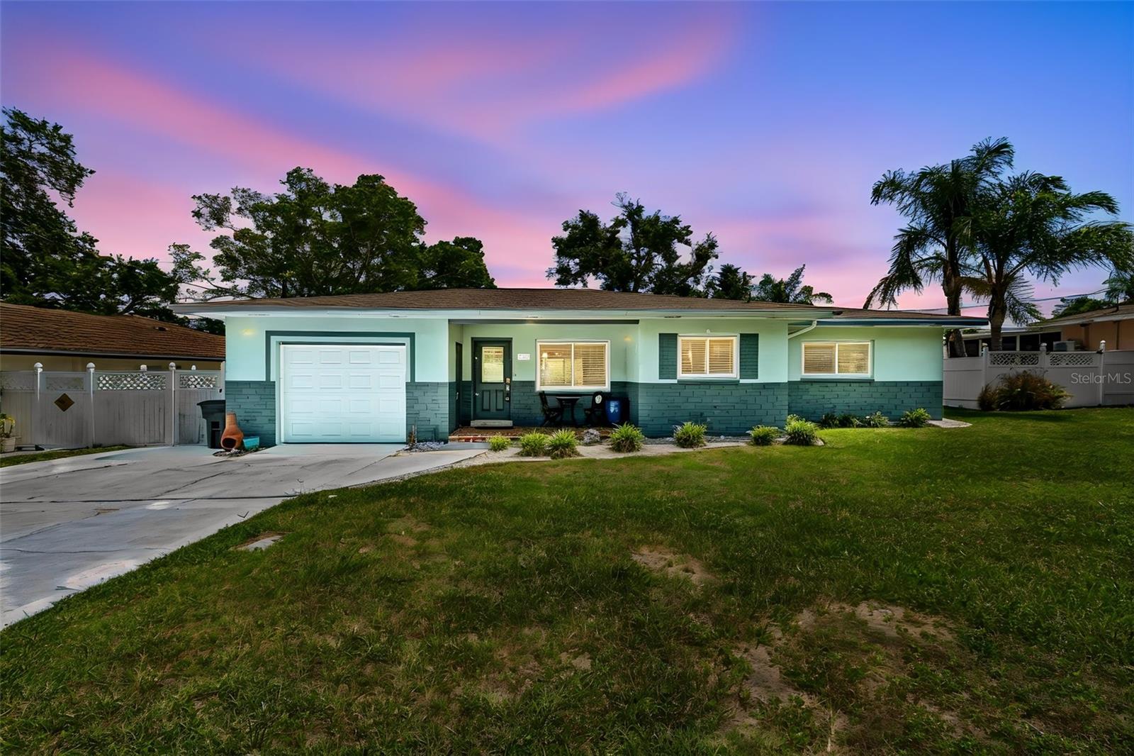 Welcome to this HIGH-AND-DRY, BEAUTIFULLY RENOVATED, WATERFRONT TURN-KEY 4-bedroom, 2.5-bathroom home offering 1,911 square feet of comfortable living space just minutes from the world-famous GULF BEACHES of Pinellas County.  Whether you're searching for a profitable VACATION RENTAL, a SEASONAL WINTER RETREAT, or a full-time WATERFRONT RESIDENCE, this beautifully UPDATED CREEK FRONT home, NOT IN A FLOOD ZONE, offers exceptional flexibility in one of Largo's most desirable locations. Thoughtfully updated over the past several years — including a brand-new HVAC system installed just months ago — this move-in-ready property is ready to enjoy from day one, with the FURNISHINGS NEGOTIABLE, making this an outstanding turnkey opportunity for buyers looking to begin enjoying the home or generating rental income—immediately.  Walk through the front door into the spacious living room/dining room/kitchen combination, the perfect gathering space for entertaining.  The kitchen includes granite countertops, stainless steel appliances, generous cabinet space, and a breakfast bar.  The split-bedroom floor plan provides privacy for owners and guests alike, with split guest bathrooms that share a shower in between.  The primary bedroom includes an EN-SUITE BATHROOM with a dual sink vanity and walk-in shower. Step outside and experience your own private Florida oasis. A large, screened lanai overlooks peaceful McKay Creek, a 7-mile stream flowing into the Gulf, where you can LAUNCH A KAYAK, PADDLEBOARD, or spend the afternoon FISHING RIGHT FROM YOUR BACKYARD. A sun deck surrounds the sparkling pool, creating the ideal setting for relaxing with family and friends after a day at the beach.  Located just minutes from the sugar-sand shores of Clearwater Beach, Indian Rocks Beach, Belleair Beach, and Sand Key, you'll enjoy easy access to boating, waterfront dining, championship fishing, and endless outdoor recreation. Tampa Bay's vibrant attractions—including shopping, restaurants, professional sports venues, and two international airports—are all within a convenient drive.  Whether you're looking to generate short-term rental income, escape the northern winters, or settle into the Florida lifestyle year-round, this versatile waterfront property offers the rare combination of LOCATION, UPDATES, and LIFESTYLE that today's buyers are searching for.
