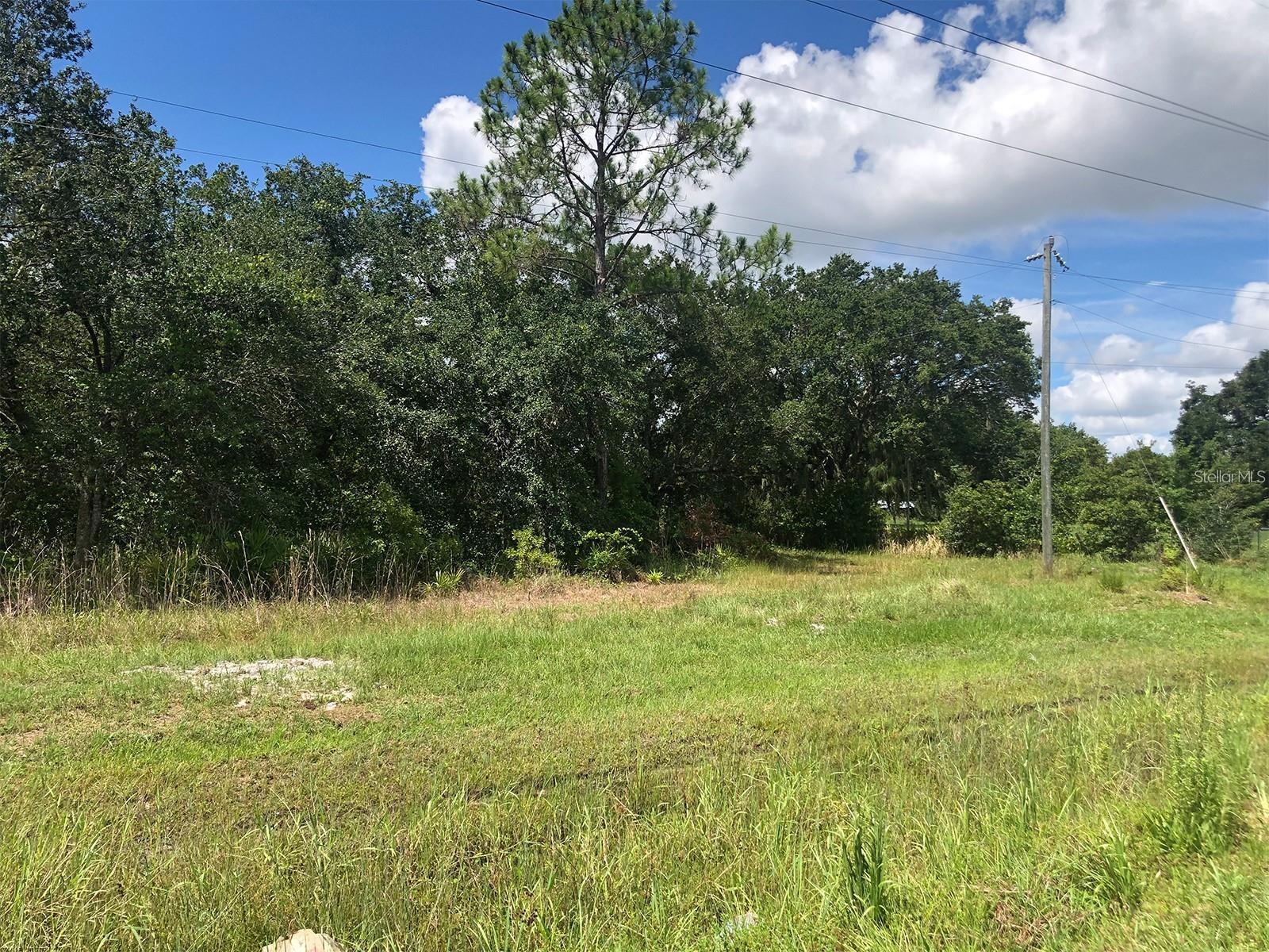 Opportunity awaits on this 1.22-acre parcel in the growing Lake Wales area! Conveniently located with direct frontage on State Road 60, this property offers excellent accessibility and visibility while providing plenty of space for your future plans. The property previously housed mobile homes, making development even easier with a well and septic system already in place. Whether you're looking to place a new manufactured home, build your dream residence, or invest in land with existing improvements, this parcel offers a head start. Enjoy the flexibility of a spacious lot with room for a home, workshop, recreational vehicles, or outdoor hobbies. With major road frontage and easy access to shopping, dining, schools, and Central Florida attractions, this property combines convenience with opportunity.

Don't miss your chance to own a versatile piece of Florida land with existing infrastructure already established. Bring your plans and start building your future today!