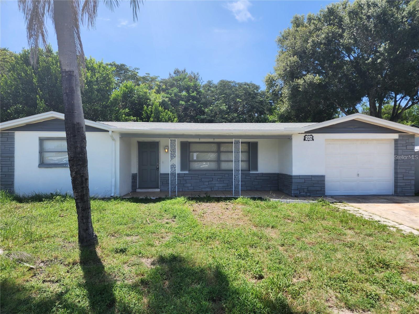 NEWER ROOF!!! RENOVATED!!!Welcome to this charming 3 bedroom, 2 bath home in desirable Gulf Highlands offering comfort, style, and a prime location! This home comes renovated!! This light and bright home features a welcoming front porch and a 1-car attached garage, perfect for easy Florida living. Step inside to an open floor plan with spacious living and dining areas, ideal for entertaining or relaxing. The updated kitchen boasts granite countertops, stainless steel appliances, tile backsplash, modern lighting, laminate flooring, and a cozy eat-in space. A large family room at the back of the home showcases oversized windows that fill the space with natural light. The spacious primary suite features an updated ensuite bathroom. The second bedroom is generously sized, and the guest bath has also been tastefully updated.  Gulf Highlands is a well-established community known for its convenient location, peaceful residential setting, and easy access to everyday amenities. You’ll be just minutes from shopping, restaurants, medical facilities, parks, and outdoor recreation. Plus, this home is close to beautiful Gulf Coast beaches, boating, and waterfront dining, making it ideal for enjoying the Florida lifestyle. This move-in ready home is beautifully maintained and ready for its new owner. Don’t miss your opportunity to own in Gulf Highlands! Schedule your showing today!