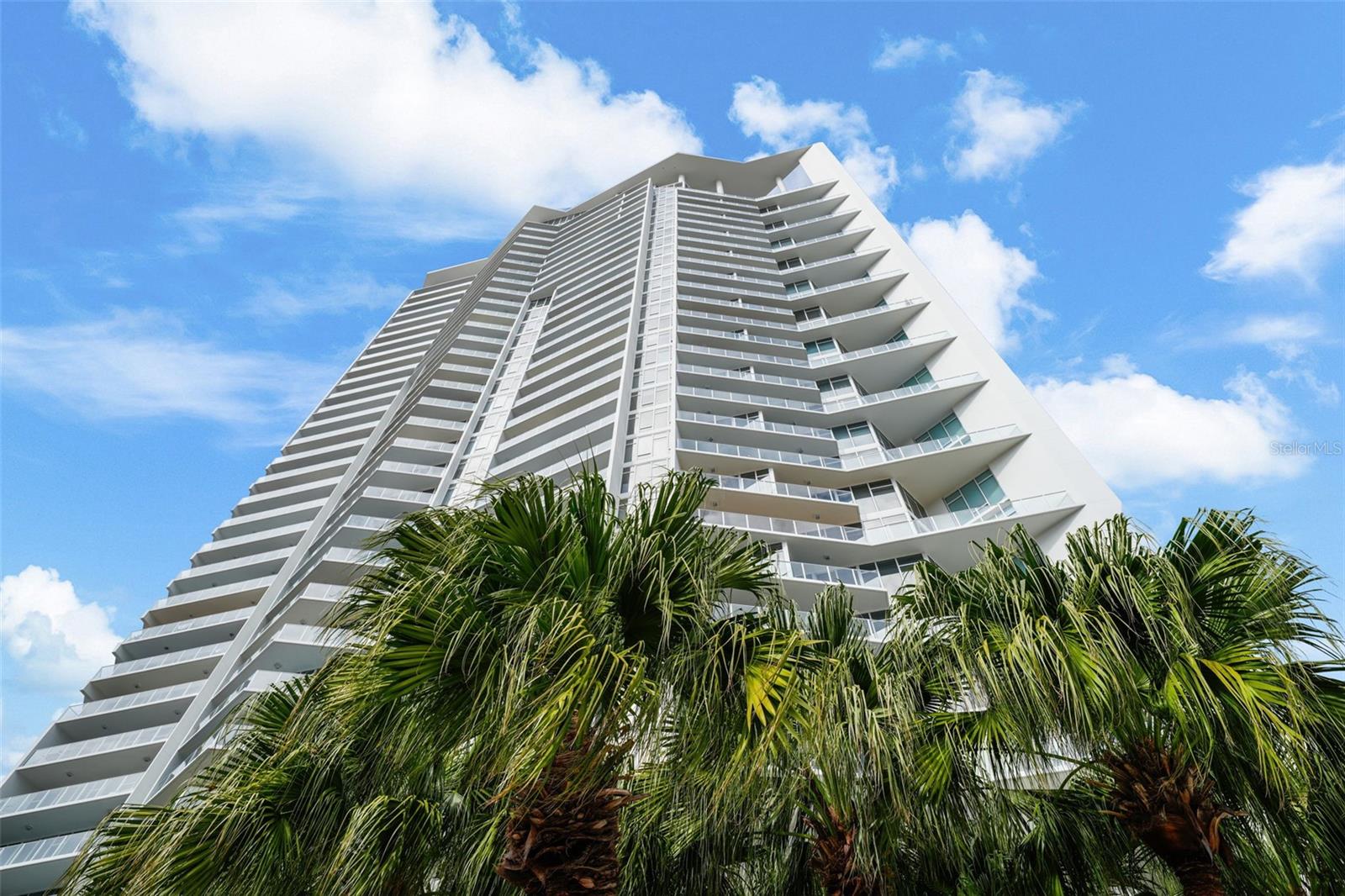 Welcome to Unit 3102 at Signature Place, where sleek modern design and breathtaking views converge in the heart of downtown St. Petersburg. This 3-bedroom, 3 bathroom residence, complete with a versatile den, redefines luxury living with its open layout, four expansive balconies, and floor-to-ceiling windows that flood the space with natural light.  Imagine waking up to sweeping views of Tampa Bay and downtown St. Pete, enjoying your morning coffee as the city comes to life below. The chef’s kitchen, equipped with premium Thermador and Miele appliances, is perfect for hosting intimate gatherings or preparing a quiet dinner to enjoy on one of your private balconies.  The primary suite is a sanctuary of relaxation, while the entertainment space provides the perfect spot to unwind, read, or simply take in the stunning vistas. This home lives like a single-family residence, offering both privacy and connection to the vibrant energy of the city.  Amazing den lends to additional space to enjoy privacy and peace.  Signature Place is more than a residence—it’s a lifestyle. From the Zen-inspired pool deck overlooking the water to the 24-hour concierge and fitness center, every detail is designed to elevate your everyday experience. With secured parking, storage, and proximity to Beach Drive, museums, marinas, and world-class dining, this is your opportunity to live the ultimate urban-coastal lifestyle.  Don’t just dream it—live it. Schedule your private tour today and claim your place in the sky at Signature Place.