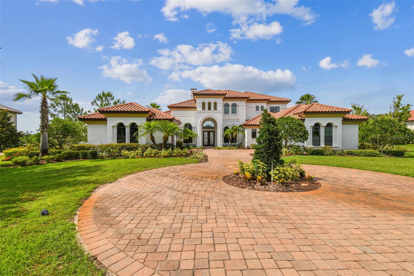 You can bring your horses. Nestled on a sprawling 2.62-acre lakefront lot within the Stonelake Ranch community, this stunning property boasts a beautiful infinity pool that perfectly complements the breathtaking views. Inside, the interior walls have been freshly painted, and new quartz countertops have been installed in the kitchen and bathrooms—excluding the primary bathroom. Enjoy access to a serene community lake, scenic horse riding trails, and a host of other amenities designed for an unparalleled lifestyle. Residents can gather at the lake lodge for holidays and events, utilize the private boat ramp to Lake Thonotosassa, and stay active in the state-of-the-art fitness center. Discover the perfect blend of tranquility and activity in this extraordinary community. Schedule your private tour today and see why this house in Stonelake Ranch is the ultimate place to call home.
