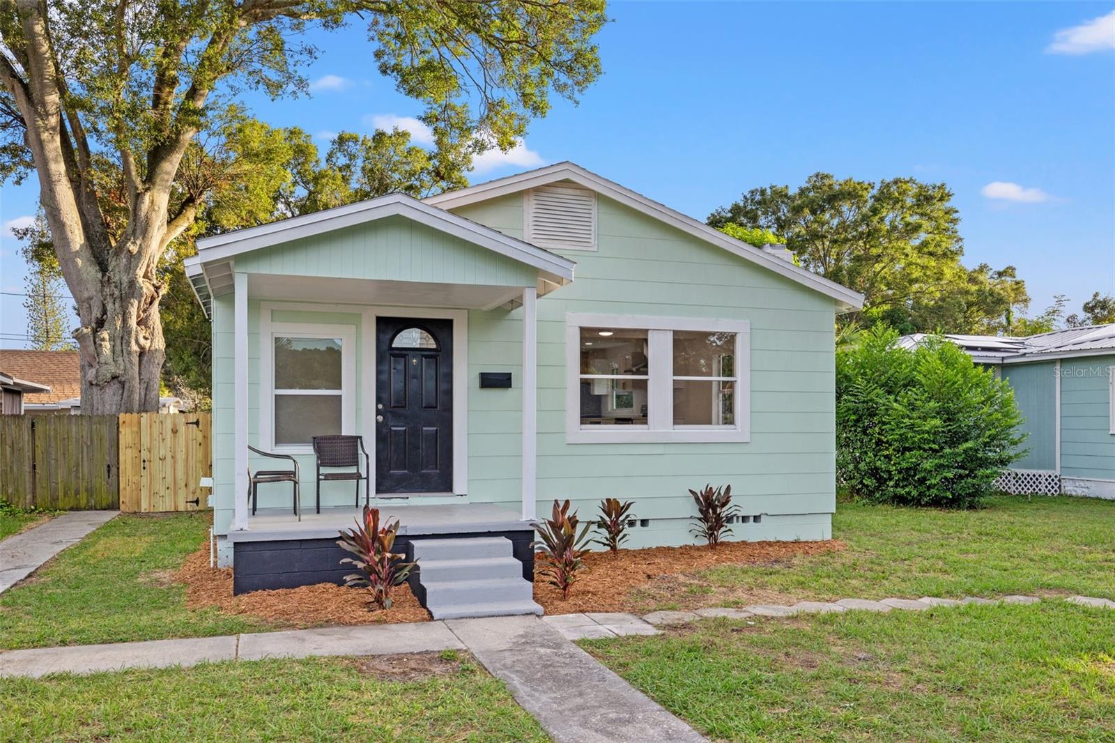 Welcome to this adorable home located in the desirable Harris Park neighborhood of St. Petersburg, FL. This beautifully renovated 2 bedroom, 2 bathroom gem offers a comfortable and modern living space with a total of 1,114 square feet.
Step inside and be greeted by the impeccable interior features that have been thoughtfully designed to create a warm and inviting atmosphere. The home has been completely renovated, boasting modern finishes and upgrades throughout. The open concept layout allows for seamless flow between the living, dining, and kitchen areas, perfect for entertaining guests or enjoying quality time with loved ones.
One of the standout features of this home is the convenient indoor laundry, making household chores a breeze. 
As you venture outside, you'll be delighted by the expansive yard that this property offers. The huge yard provides plenty of space for outdoor activities, gardening, or even adding a pool. The yard is completely fenced, ensuring privacy and security for you and your loved ones.
Location is key, and this home does not disappoint. Situated just minutes away from downtown St. Petersburg, you'll have easy access to a plethora of dining, shopping, and entertainment options. With quick interstate access, commuting to neighboring cities or attractions is a breeze. And for those who travel frequently, Tampa International Airport is just a short 20-minute drive away.
Don't miss the opportunity to make this incredible home yours. Schedule your private showing today and experience the charm of Harris Park living in beautiful St. Petersburg, FL. Roof 2014, AC 2016, driveway 2021.