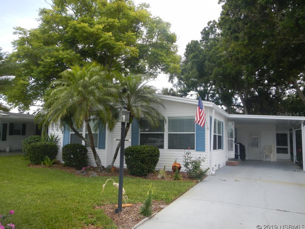 Spacious open flowing floor plan that includes oversized master bath with jacuzzi, his and her sinks and lg. walk in closet. This 3 bedroom 2 bath home has been newly painted inside and out. Upgrades also include new roof in 2016, new A/C unit 2015 and new carpet installed 2017. Enjoy the large sunny eat in kitchen with island and lots of cabinet space.  Family room with windows all around to let the Florida sunshine through. Shaded Screened porch area and plush landscaping. Dining room features build in china cabinet. Edgewater Landing is a riverfront community with lot's of activities. Just a few amenities are resident boat intracoastal access, intracoastal fishing pier, heated pool, screened hot tub, fitness center, ceramics classes,  tennis, bocci and entertainment committee. Perfect setting for an active Florida retirement lifestyle. Enjoy living in paradise with Resort living every day!No Lot rent. ;Water: City