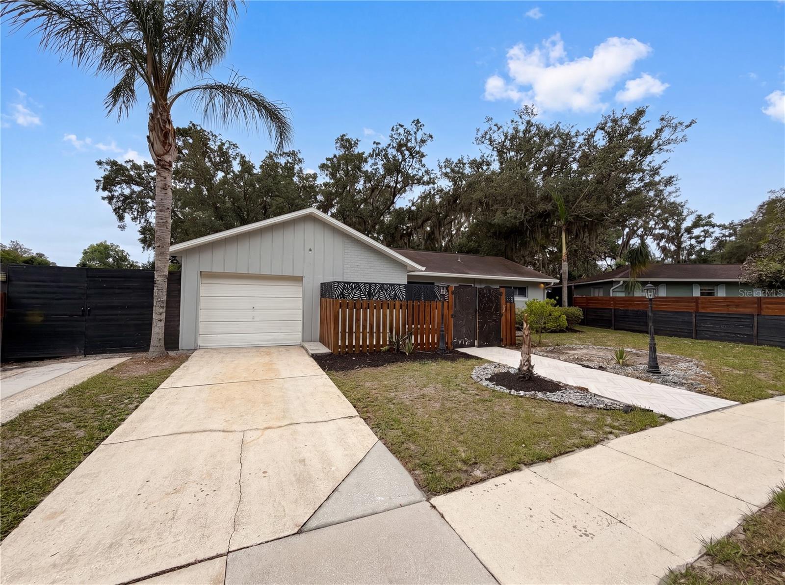 One or more photo(s) has been virtually staged. Come see 10316 Belgrove Pl, recently updated with fresh interior paint and a partial flooring replacement. The kitchen features stainless steel appliances paired with an accent backsplash. Outside, a covered patio overlooks the fenced in backyard. Experience updated comfort and functional outdoor living in this property.. Included 100-Day Home Warranty with buyer activation