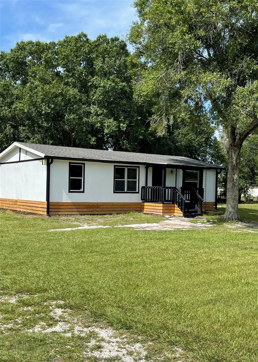 Enjoy this spectacular manufactured home situated on a 1.72-acre lot—offering ample outdoor space for your exclusive use—in the picturesque town of Saint Cloud. The home features 3 bedrooms and 2 bathrooms. Upon entering, you are welcomed by a spacious living room that connects to a cozy dining area and the kitchen. The kitchen and bathroom cabinetry are in good condition and feature granite countertops; additionally, the home boasts well-maintained appliances, flooring, and lighting, among many other upgrades. It offers easy access to the beaches of Cocoa and Melbourne. There are no HOA fees or CDD taxes. Bring your boat, RV, and more! Schedule a viewing today. All measurements are approximate and not guaranteed; any information contained herein that is critical to the purchase decision should be verified by the buyers. Please submit your best offers.