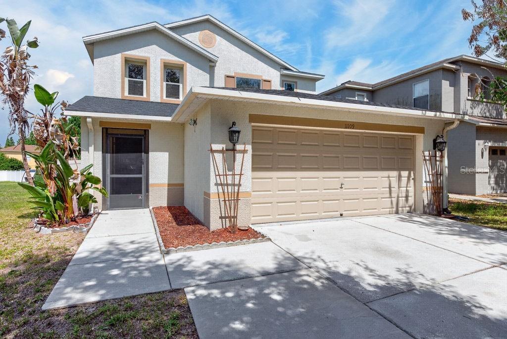 Florida living takes center stage in this beautifully maintained 3-bedroom, 2.5-bath home tucked inside the gated community of Moss Landing. Combining flexible interior spaces with an exceptional backyard retreat, this residence offers the perfect setting for both everyday comfort and unforgettable entertaining. Inside, you'll find 1,626 square feet of thoughtfully designed living space featuring an open-concept kitchen and family room that creates a seamless flow for gathering with family and friends. The kitchen is appointed with solid-surface countertops, stainless steel appliances, and ample workspace, offering a stylish and functional heart of the home. Generously sized living areas, large bedrooms, walk-in closets, and an inside utility room provide comfort and convenience throughout. A versatile flex space adds even more functionality and can easily serve as a home office, study area, playroom, fitness room, or hobby space to fit your lifestyle. Step outside and discover what truly sets this property apart. The recently installed screened-in pool, completed just two years ago, creates a private oasis where you can relax and enjoy Florida's sunshine year-round. Designed with entertaining in mind, the backyard features a fully equipped outdoor kitchen, a charming tiki bar, and plenty of room for weekend cookouts, celebrations, or quiet evenings under the stars. Sliding glass doors provide easy indoor-outdoor living, making the most of every gathering. The spacious lot also includes a large outdoor shed, offering valuable storage for tools, lawn equipment, recreational gear, or workshop space. Additional highlights include a newer roof, oversized rooms, and the peace of mind that comes with living in one of the area's sought-after gated communities. Moss Landing residents enjoy convenient access to shopping, dining, schools, and major commuter routes while still enjoying a sense of privacy and community. Offering the rare combination of modern updates, flexible living space, and resort-style outdoor amenities, this move-in-ready home is ready to be enjoyed from day one. ***FREE 1/0 Rate Buydown when using the seller's preferred lender!***