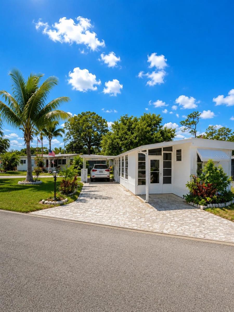 Welcome to this beautifully renovated mobile home where comfort and tranquility come together! This charming property features 2 spacious bedrooms, 1 updated bathroom, and an open-concept kitchen and living area, creating a bright and inviting space perfect for everyday living and entertaining.

The home includes and sits on its own land — meaning you own the land outright with no lot rent! This makes it an excellent investment opportunity or full-time residence. Conveniently located in a highly desirable area, you’ll enjoy easy access to shopping, dining, and local attractions while still experiencing a peaceful atmosphere.

Located in a wonderful and well-maintained community known for its quiet and relaxing environment, this property is ideal for those seeking comfort, convenience, and a serene lifestyle. Don’t miss this fantastic opportunity!

Please note: Some interior photos feature virtual staging to demonstrate design possibilities.