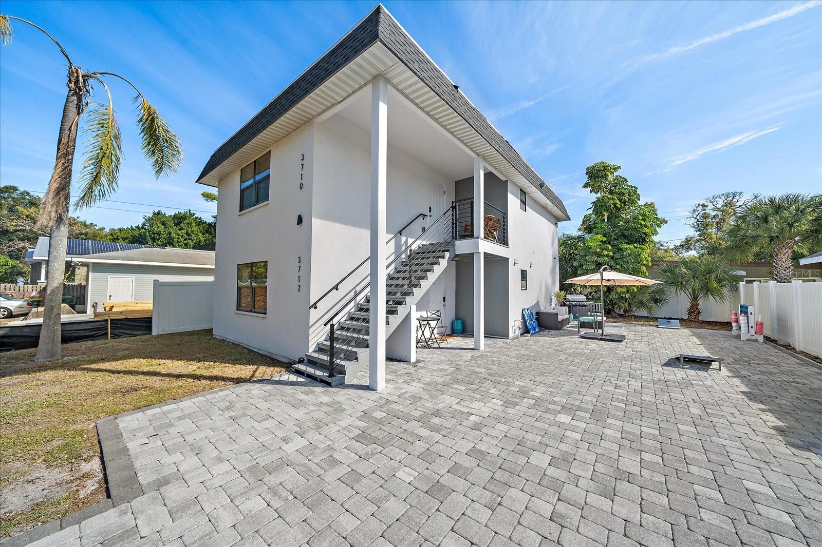 NEW PRICE-Well-maintained, income-producing turn-key duplex located at 3710 & 3712 Iroquois Avenue in the established Sapphire Shores submarket of Sarasota. Each unit is configured with 2 bedrooms and 1 bath each 852 square feet, offering functional layouts with updated kitchens, remodeled baths, and efficient living and dining spaces that support consistent tenant demand. Interior renovations were completed in 2017, followed by substantial capital improvements in 2020, including new stucco, roof, windows, flooring, kitchens, and baths—reducing near-term capital exposure. Each unit operates independently with separate utilities and in-unit laundry, supporting operational efficiency and long-term tenancy. One A/C was replaced with new, in 2024. All furnishings convey, allowing for a turnkey transition and uninterrupted rental operations. The property demonstrates consistent occupancy and documented performance of both 2024 and 2025, each north of $70,000 gross, with forward bookings already in place for 2026. No HOA and no CDD provide added flexibility and help contain ongoing ownership costs. Operating expenses are tracked annually and available for review. Sapphire Shores remains a durable rental location due to its proximity to Downtown Sarasota, the Ringling Museum District, bayfront parks, and direct access to US-41, beaches, and major employment corridors. This asset offers a proven rental history, completed capital upgrades, and stable location fundamentals—well-suited for an investor prioritizing durability, efficiency, and long-term hold potential. Complete financials, operating history, available. Showing scheduled on the turnover days schedule, permitting.