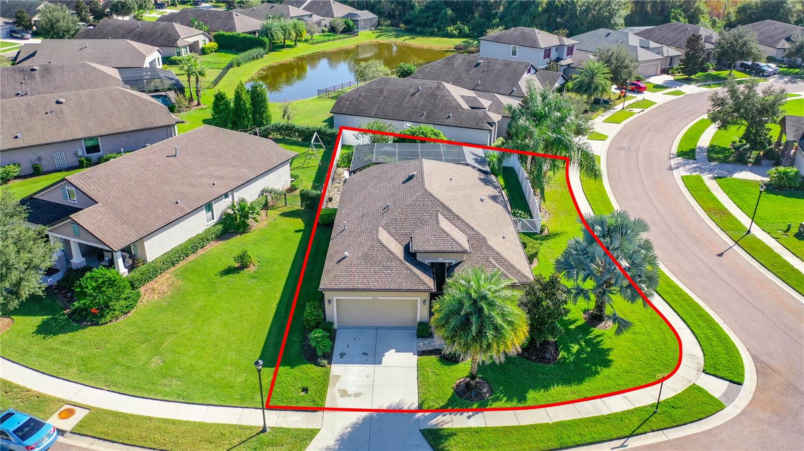 Beautiful three bedroom POOL home sitting on manicured lot with a fence for privacy.  Walk up to the front door, open it and step into a ceramic tile foyer.   Look ahead and take a deep breath and know you are home! Moving forward will take you into an elegant living room with ceramic tile flooring and two-tone paint colors that work together to bring this home alive and the crown molding adds a touch of class.  Open floor plan of this home allows for an easy flow when entertaining from kitchen through living room and out onto lanai.  Open the sliding glass doors and take in the salt water pool and the Waterfall.  Nice.  Kitchen cabinets with crown molding across top are in an Expresso color and the backsplash adds much to the design.  Granite counter tops in kitchen and on the breakfast bar.  Breakfast Nook sits to the right of the kitchen and has three windows for fantastic views of the pool and mature landscaping. Wainscoting tops this breakfast nook off.  Relax and enjoy your breakfast! Stainless Steel Appliances include the Refrigerator, Gas Stove, Dishwasher and Microwave.  Double Stainless Steel sinks in kitchen. Just Beautiful! Dining room has a double trey ceiling and contrasting wall colors and windows are adored with Plantation Shutters. Carpeted Master Bedroom has three windows allowing for a beautiful view of the backyard with pool. Master bath has double sink granite counter tops with cabinets the color of the kitchen cabinetry. A walk in tiled shower. Let's move out to the lanai and pool area.  Both lanai and pool have decorative pavers. Take in this beautifully designed pool with waterfall and the mature landscaping as well.  Absolutely charming. 
This area could be great when entertaining as well.  Open the doors, turn the music on and enjoy. This home has a Tankless natural gas hot water heater,  Front and Backyard Landscape Lighting, Custom Landscaping, High end Built-in Surround Sound and Outdoor Speakers, Wired Ethernet throughout, Crown Molding in most rooms and Upgraded Base Boards throughout, Plantation Shutters and Custom Shades throughout, Water Softener System, Upgraded Termite Protection System, Rounded Corner Beads throughout.  Make sure to view the photos and video.  Buyers and Buyer's agents to verify room measurements and HOA requirements.