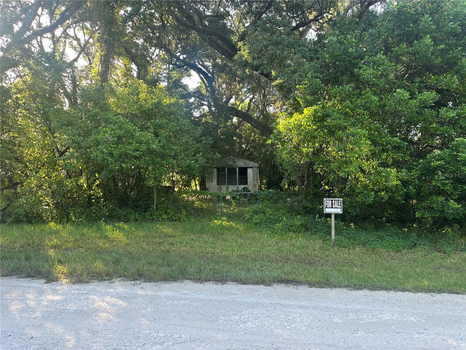 This unique area of Masaryktown has a very pleasant atmosphere rarely found in the Springhill. The Mobile itself is in need of being fully renovated or simply replaced. The actual value of this property is the land along with its already installed needs. Such as water, power pole, septic, and impact fees already paid. Instead of purchasing land to build that will need all of those things, this property is ready for your vision to come to life.