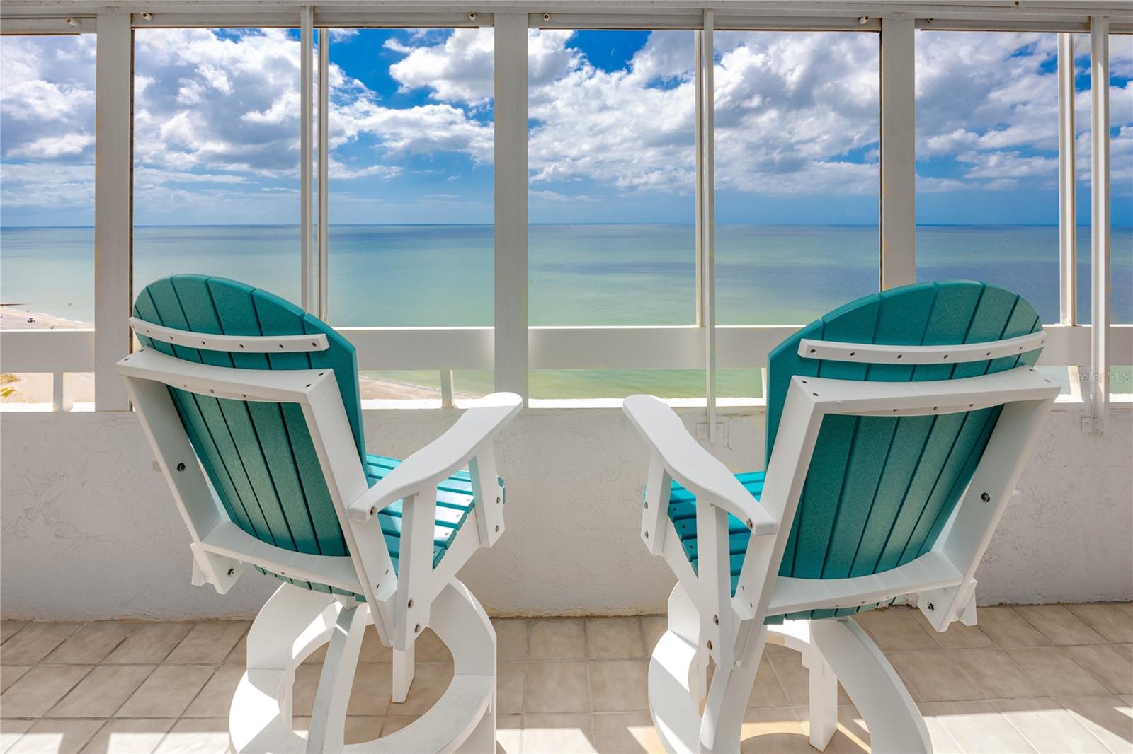 Last & FINAL HUGE price reduction on this beautiful, fully renovated beachfront condo.

If you have been waiting for that perfect, RARELY AVAILABLE 3 bdrm 2 bath END CORNER UNIT DIRECT beachfront condo with a WRAPAROUND balcony and direct views of the Gulf of America, that day is here! Sunrises and sunsets are plentiful on the approx. 350 sq ft balcony with direct beach views. The front entrance to the condo offers another privately gated balcony with 123 sq ft for views of Boca Ciega Bay and beautiful skylines of nearby cities. Here you get the best of both worlds with direct beachfront AND Intracoastal views. All balconies have hurricane shutters that also help in keeping the condo cool on hot summer days. The owners have extensively renovated the unit ceilings to floors. The very large kitchen offers not 1 but 2 counter height islands with enough seating room for 6. Quartz counters tops with matching quartz backsplash and the highly desired waterfall feature and pop-up outlets. All lower cabinets have pull-out soft close drawers, under cabinet lighting, 2 Pantry closets and recessed lighting. All 3 bdrms are good sized, recessed lighting throughout the home, newer (2023) sprinklers, CAT 5e ethernet, Full size dining room and living room, all flooring is matching LVP throughout the home, water views from every room except bathrooms. The 16th floor only has 3 other units. There is even a 4.5’ x 5’ storage unit for your beach chairs, umbrellas, holiday decorations etc. located on the garage level making it easy to keep sand out of the condo. This community offers 24/7 guarded & gated security, visitor parking, bike storage racks in the garage, temperature-controlled pool, The Beach Clubhouse has been renovated that includes a billiard room, gym, ballroom, card room and library. Building 3 exterior has been painted and finishing touches are being done.   All room sizes are approximate and to be verified by buyer. This residence is located in a building that does not permit short-term (weekly) rentals, ensuring a more private and peaceful living environment for residents. One Month minimum rentals allowed.