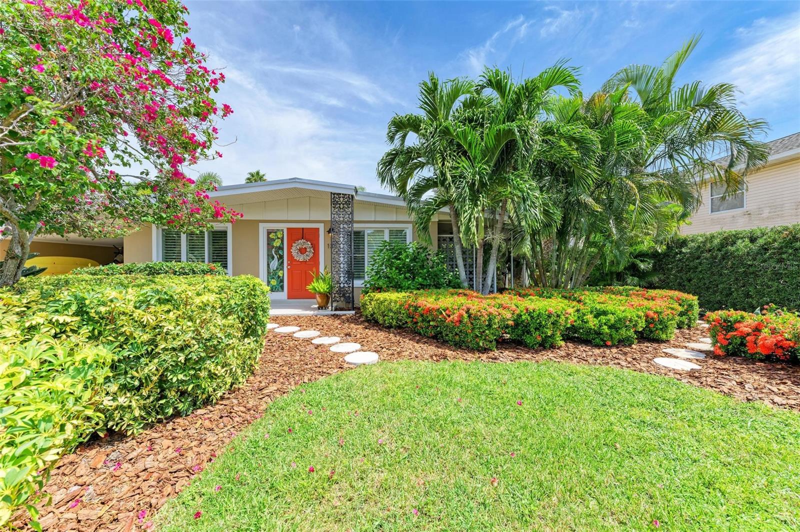 The Beach Is Calling!!! Best priced Anna Maria City move in ready single family home with room for a pool. Anna Maria Island charming remodeled coastal cottage.  Newer metal roof, ALL impact windows and sliders in place for added peace of mind. NEW A/C, Washer/Dryer, Refrigerator, Dishwasher, Bedroom Carpets and Interior Doors. 2024  Now is the time for new owners to make 136 Crescent Dr their own island oasis. Whether you are looking or a primary residence, second home or investment property this home is an ideal opportunity. Located in the quiet and serene City of Anna Maria on the north end where short term rentals are welcome. Just north of quaint shops and restaurants of renowned Pine Avenue and Anna Maria City Pier. Bayfront beach park, Rod and Reel Pier and tranquil Bean Point are all nearby. Gulf beaches with their soft white sand, turquoise waters and dazzling sunsets await your presence. Careful consideration was given to the interior remodel a few years ago. Bright wide plank ceramic tile flooring throughout the living area. Kitchen offers plantation shutters, quartz countertops, recessed lighting, soft close cabinetry, stainless steel appliances, breakfast bar and cozy dining nook surrounded by stylish built in storage. Spacious comfortable living area opens to private screened lanai surrounded by lush tropical plantings. Lovely primary suite offers king size bedding, sliders to screened lanai and private bath with walk in shower and granite countertops. Secondary bedroom adorned with built in nightstands, recessed TV console and pocket door to hall bath for another en suite. Both bedrooms offer closets with built ins, plush carpeting, plantation shutters and ceiling fans. Relax on the private rear patio and you’ll be surrounded by a plethora of tropical plantings of Bougainvillea, Crotons, Birds of Paradise, Ixora and Schefflera to name a few. Fresh new plantings blooming this Spring. Carport offers kayak/bike storage, utility closet and outdoor shower. Room for a pool if you desire. Voluntary HOA available to enjoy the day dock and kayak launch. Come an explore the whole island experience with free trolley to shops/dining of Holmes Beach and eclectic mix of stores along Bridge Street and Bradenton Beach.