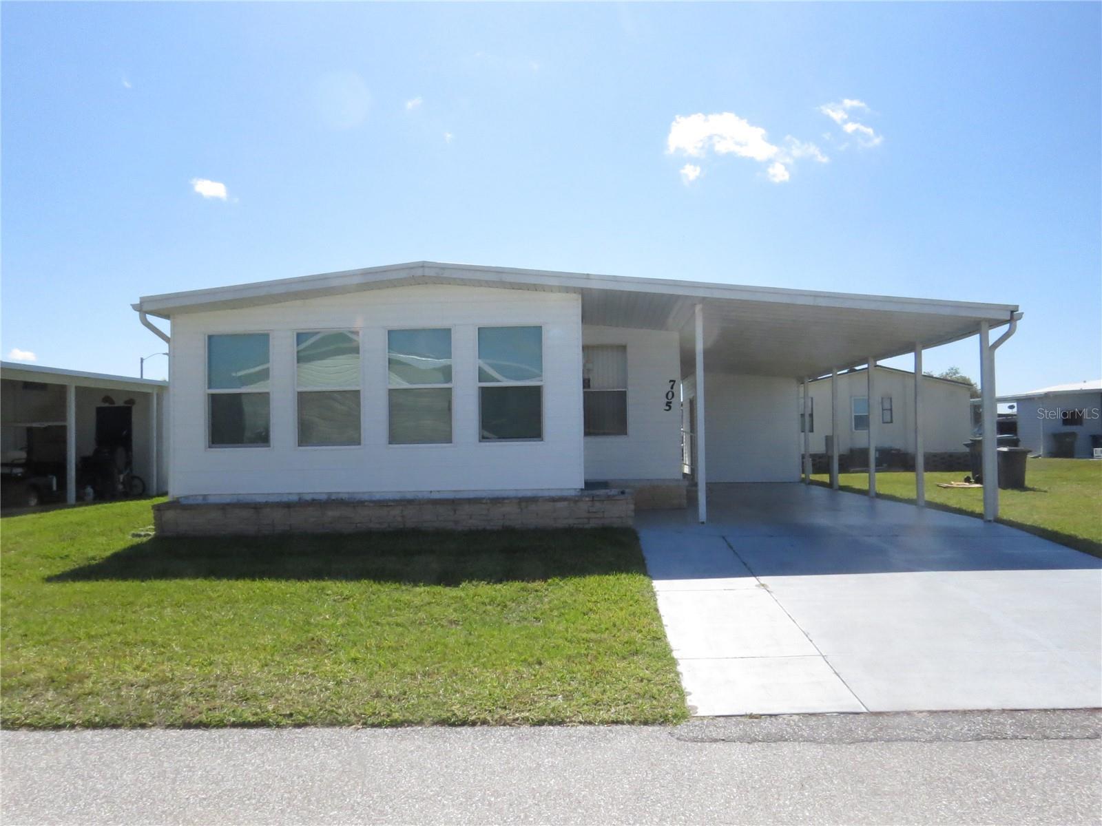 Harbor Cove is a desirable 55+ waterfront community that has everything you need to enjoy paradise. Optional: Recreation/fitness center, a slip in the marina, and a space in compound/storage. Enjoy Florida's Retirement Lifestyle at an affordable price. This home features 2 bedrooms and 2 full bathrooms, a nice size kitchen, living room, dining room plus a remodeled Florida room off the front of the home, a shed with laundry room and storage area. This community is pet friendly. Located on the sought after Myakka River; the 90 slip Marina is a boater's dream come true. Dry storage is also available. Charlotte Harbor and Gulf of Mexico are nearby. Harbor Cove has two heated pools, hot tubs, tennis courts, shuffleboard, pickle ball, horseshoes, water aerobics, fitness classes, art classes, woodworking, golf cart parades, bingo, and dances. Boat clubs, a craft room, picnics on the patio, golf clubs, bowling clubs and much more. There is plenty of wildlife to enjoy in this 190 acre community. Conveniently located within minutes of Downtown shopping, restaurants, and a short drive to beautiful Gulf Beaches.