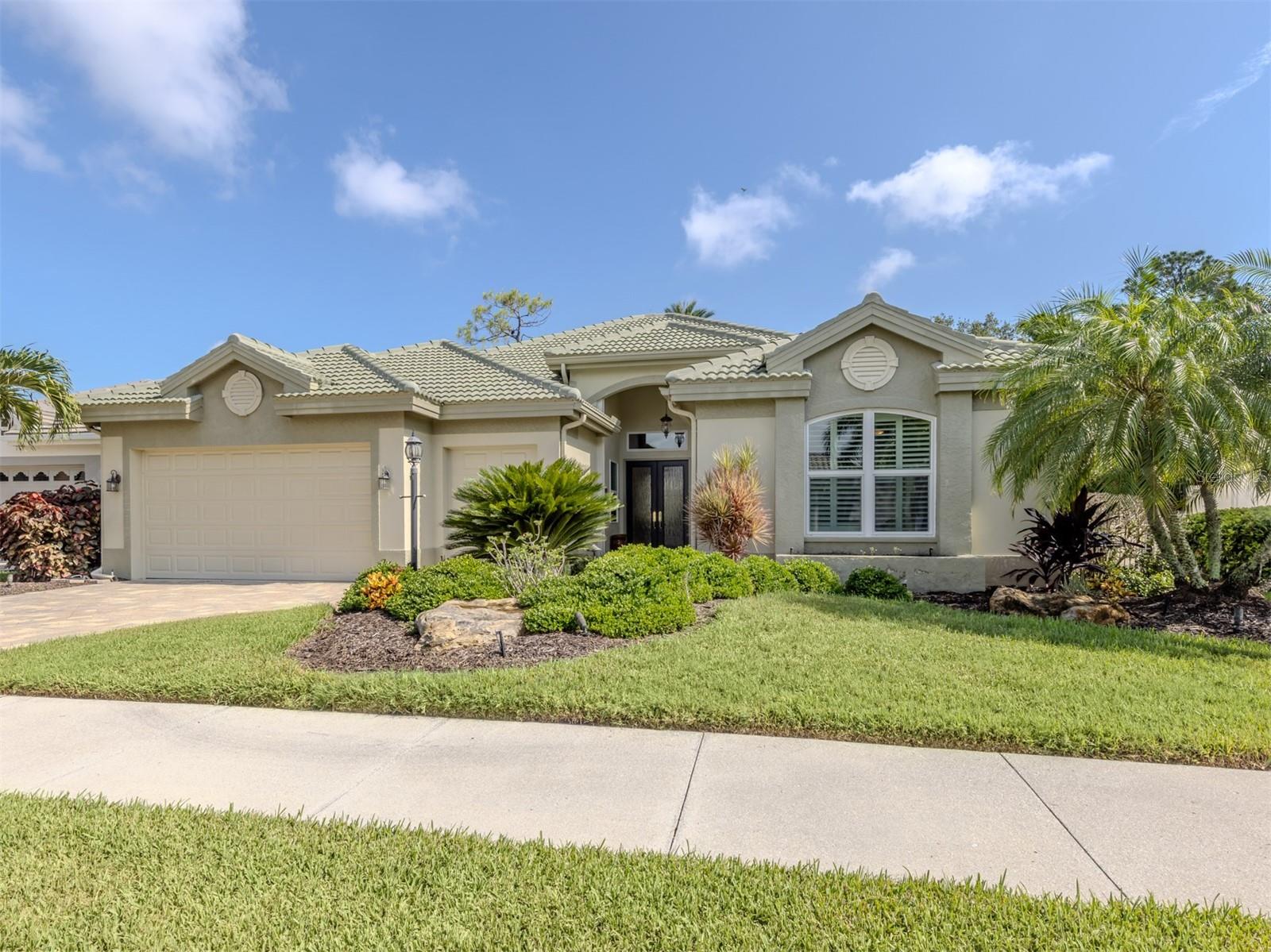 Elegant and luxurious single-family home with three bedrooms, four baths and a two-car garage with added golf cart garage parking. On a private cul-de-sac away from service and golf cart traffic, this residence is sure to delight. A private and protected preserve view with no homes behind or golf cart path in sight. Providing a flood zone X lot adds security and peace of mind. Hurricane impact windows, roof replaced, garage door replaced and house re-plumbed. Renovated pool and spa with pebble interior finish, travertine pool deck, designer copper spa spillways, summer kitchen with barbecue and a covered sitting area with Kevlar hurricane electric rolldown curtain complete this backyard oasis. Offered with a full golf membership opportunity. The Venice Golf and Country Club has been recently reimagined. The expanded clubhouse features a spacious gathering bar, gourmet and commercial kitchens, and a cozy fire pit. Members enjoy casual and special event dinners throughout the year. The new state-of-the-art Wellness Center offers massage therapy, fitness classes, yoga, physical therapy, and personal training, providing a holistic approach to health and well-being. The beautifully renovated Ted McAnlis-designed 18-hole championship golf course is treasured and highly rated as one of the best and well-maintained golf courses in the region. Residents also enjoy Har-Tru tennis courts, bocce ball and a junior Olympic-sized pool and spa, balancing active living with relaxation. As a Geo-Certified Audubon Cooperative Sanctuary, VGCC embraces environmental stewardship and sustainability. With an A+ financial rating, the community is as solid as it is serene. Ideally just minutes from airports, shopping, dining, Interstate 75, cultural venues and Wellen Park is this charming home. It's also a short drive to treasured Venice Island, where 14 miles of pristine beaches meet the sparkling Gulf Coast. Envision your next exceptional journey at The Venice Golf and Country Club.