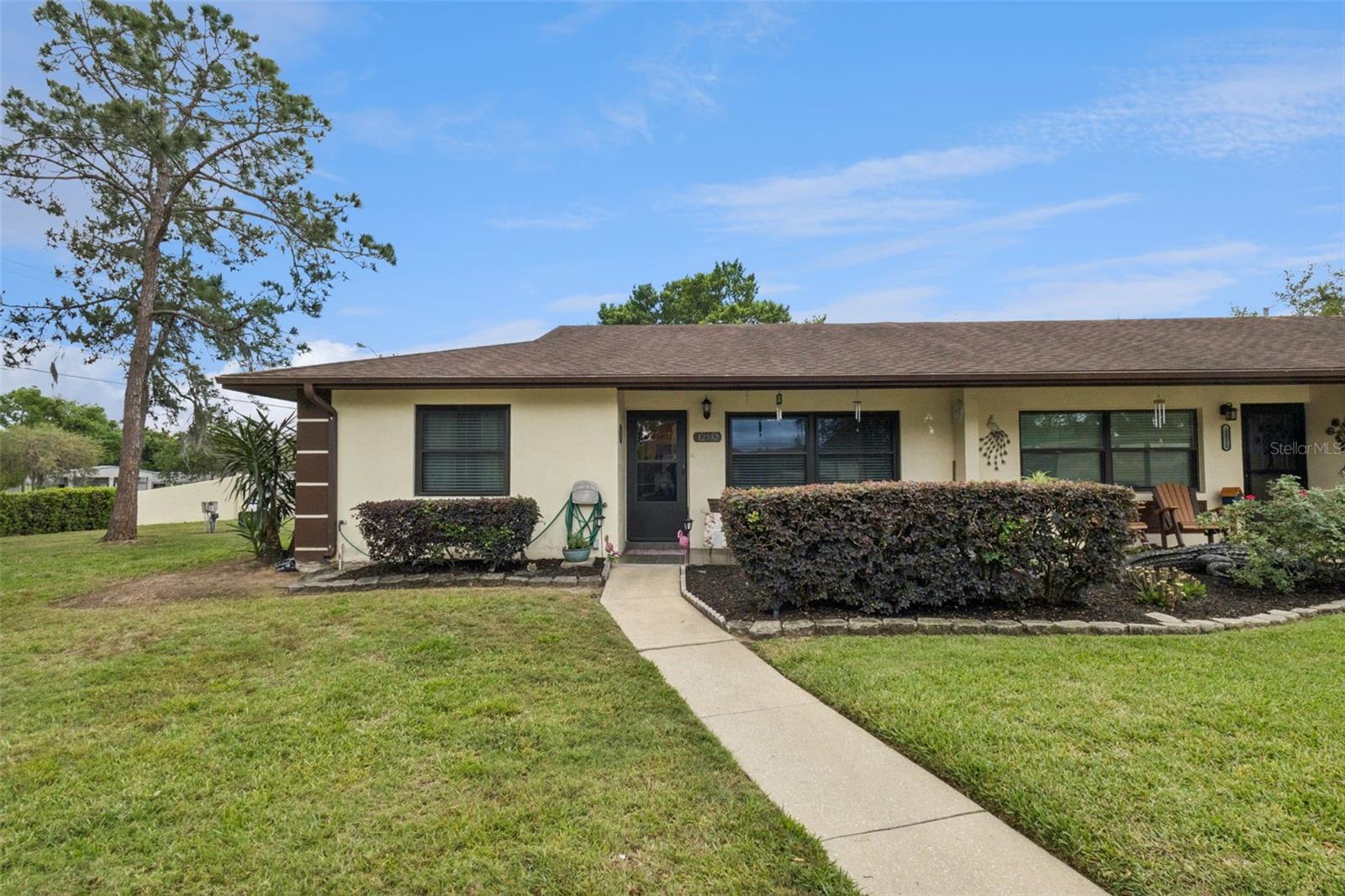 Easy Living Awaits in This Beautifully Updated End Unit Villa! Experience a great Florida retirement in a 55+ community of Summit Chase Villas. This charming 2-bedroom, 2-bathroom end unit villa offers the ultimate low maintenance lifestyle in "America’s Seaplane City" in Tavares, FL. This location is well known for its scenic Harris Chain of Lakes. Start your mornings on the inviting front porch and spend your afternoons relaxing in the private, screen enclosed patio. This home has been meticulously maintained. There is an updated kitchen and new lighting and other upgrades. The HVAC unit is less than one year old; the HOA has replaced the roof with an architectural shingle roof in 2017. This stunning home is walking distance to new retail amenities, gas station and a Publix Grocery Store and restaurants. It includes a covered carport and also a dedicated storage unit. Residents enjoy community amenities such as a social clubhouse, a sparkling community pool, and shuffleboard courts. Request your private tour today and start enjoying this awesome Florida living.