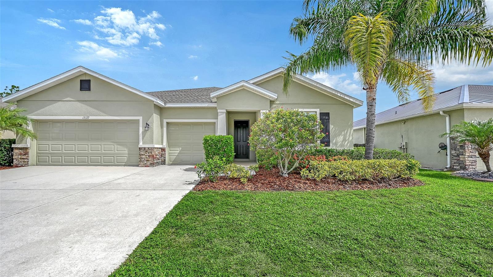 Welcome to this beautifully updated 4-bedroom, 3.5-bath home offering 2,810 square feet of thoughtfully designed living space on a quiet cul-de-sac street. Built in 2018, this open-concept home is ideal for modern living and features a versatile bonus room with a private en-suite bedroom, making it perfect for multigenerational living, guests, or a private home office. Recent upgrades provide peace of mind and style, including a new roof (2025), fresh interior paint in the bedrooms and bonus room (2023), new wood laminate flooring in the bedrooms and bonus room (2023), updated light fixtures (2023), and an extended backyard patio with pavers (2023), creating the perfect space for outdoor entertaining. Located in a community with low HOA fees and no CDD, residents enjoy resort-style amenities including a sparkling pool, outdoor kitchen, fitness center, park, and soccer fields. Families will appreciate the A-rated schools, while everyone will love being just five minutes from shopping, dining, and everyday conveniences. This move-in-ready home offers the perfect combination of comfort, functionality, and an exceptional lifestyle.