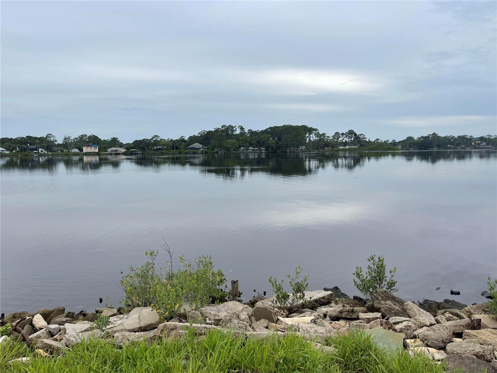 Rare 1 acre waterfront lot on tranquil Turnbull Bay.  This expansive lot is surrounded by water on three sides.  Lot is cleared and ready to build your dream waterfront home.  Owner is a licensed Real Estate Broker.