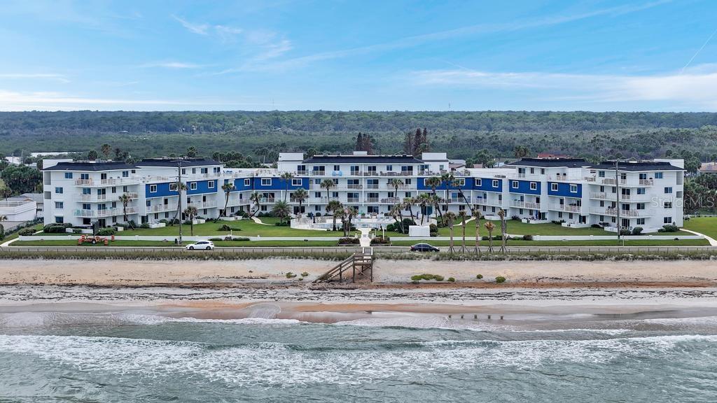 Oceanfront 2-bedroom, 2.5-bath condo with a spacious townhouse-style layout and stunning coastal views. Enjoy breathtaking sunrises and the relaxing sound of the waves from this beautifully maintained beachside retreat. The main floor features an open living and dining area plus a convenient half bath for guests. Upstairs, both bedrooms include private full bathrooms for added comfort and privacy. Enjoy easy access to the newly remodeled pool, private beach access, gas grills, shuffleboard, green space, tennis court, secondary laundry area, and ample parking. HOA covers cable, internet, water, trash, pest control, and exterior maintenance for easy living. Since 2023, the building has seen major improvements including a new roof, exterior coatings, staircase rebar repairs, railing refinishing, and a rebuilt pool deck meeting updated engineering standards.

Conveniently located near Gamble Rogers State Park, Flagler Beach Pier, golf courses, parks, boating, kayaking, biking trails, shopping, dining, entertainment, and just 30 minutes to Daytona Beach International Airport. Furnishings included.