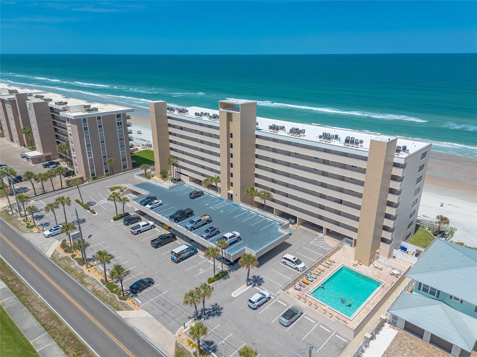 Direct oceanfront fully furnished 2-bedroom, 2-bath penthouse condo offering breathtaking ocean views from the highly desirable no-drive beach in beautiful Ponce Inlet. The spacious primary bedroom overlooks the ocean and features an updated en suite bath with a walk-in shower. The kitchen is equipped with newer stainless-steel appliances, and the unit features tiled flooring throughout along with new windows and sliding glass doors. Excellent investment opportunity with great rental income potential and a one-week minimum rental policy, making it one of the few properties in Ponce Inlet allowing weekly rentals. Enjoy the charm of quaint Ponce Inlet with its waterfront restaurants, historic lighthouse, pristine no-drive beach, and the nearby Marine Science Center, all while experiencing the ultimate beachfront lifestyle.