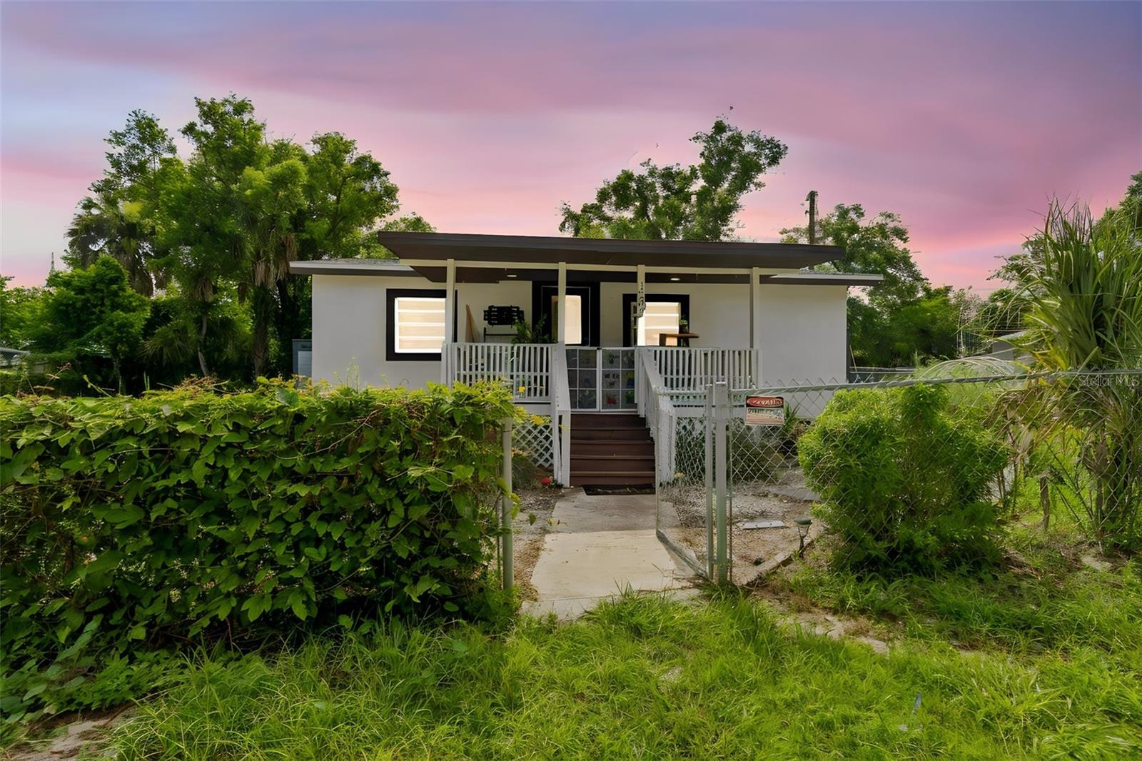 Welcome to 1202 E Annie Street, a beautifully updated Tampa home offering comfortable living, modern finishes and a convenient central location. Inside, the inviting open floor plan creates an easy flow for everyday living and entertaining. The kitchen features stone countertops, solid wood cabinetry and plenty of workspace, while central heating and air conditioning provide year-round comfort. A dedicated laundry area adds everyday convenience.

Step outside and enjoy a spacious fenced yard with room for outdoor dining, gardening, pets, recreation or future improvements. With no HOA, homeowners have additional flexibility without monthly association fees or restrictive community rules.

Located in the heart of North Tampa, this home offers easy access to I-275, Busch Boulevard, Fowler Avenue and Nebraska Avenue, making travel throughout the Tampa Bay area simple. Busch Gardens Tampa Bay, Adventure Island, the University of South Florida and ZooTampa at Lowry Park are all nearby. Residents can also enjoy the popular restaurants, breweries and local shops of Seminole Heights, along with convenient access to downtown Tampa, Ybor City, Armature Works, the Tampa Riverwalk, Water Street and Amalie Arena.

Nearby parks and outdoor destinations provide additional opportunities for recreation, while shopping, dining, schools, medical facilities and everyday essentials are only minutes away. Whether you are searching for a primary residence, Tampa investment property or centrally located home with a private yard, 1202 E Annie Street offers an outstanding combination of location, flexibility and lifestyle.