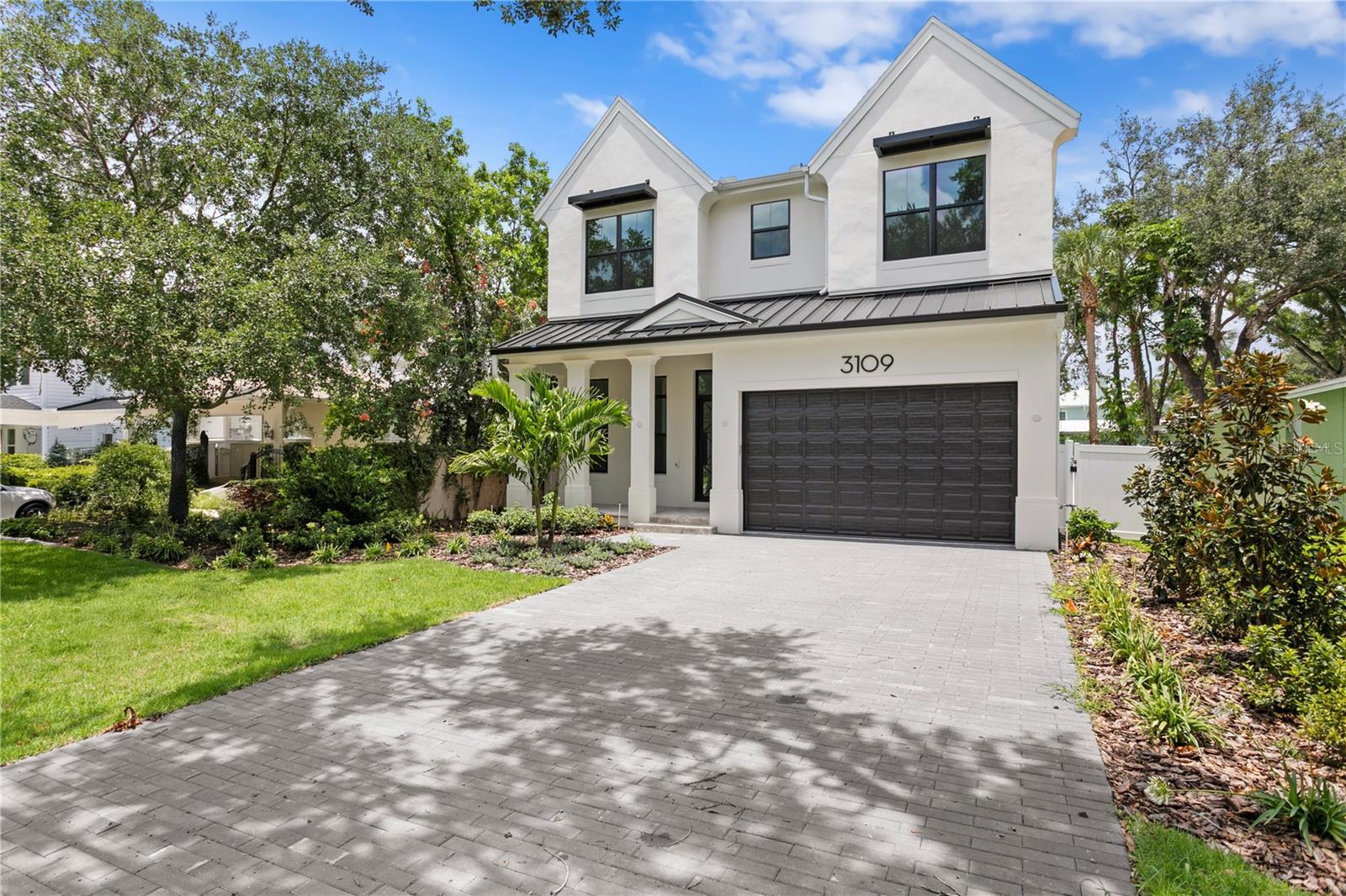 Discover the epitome of luxury living in the heart of South Tampa with this exclusive new construction home, just a leisurely walk from the picturesque Bayshore. Meticulously crafted by an award-winning builder, this residence offers a blend of sophistication and comfort.
Featuring 4 bedrooms and a versatile den that easily converts to a 5th bedroom, along with 5 full bathrooms, this home provides ample space for families and guests. The open layout seamlessly integrates high-end finishes, including hardwood flooring and a custom wine bar, creating an inviting ambiance for both everyday living and entertaining.
The gourmet kitchen, equipped with top-of-the-line appliances and custom cabinetry, is a chef's dream. Each bedroom boasts its own walk-in closet, and a thoughtfully designed mudroom adds convenience to daily life.
Outside, the inviting pool and stylish paver driveway enhance the property's curb appeal, offering a relaxing retreat and a warm welcome for guests. With its prime location and meticulous attention to detail, this home embodies the best of South Tampa living.  Walk to Bayshore.
Experience the perfect fusion of luxury and functionality in this stunning property. Your dream home awaits.