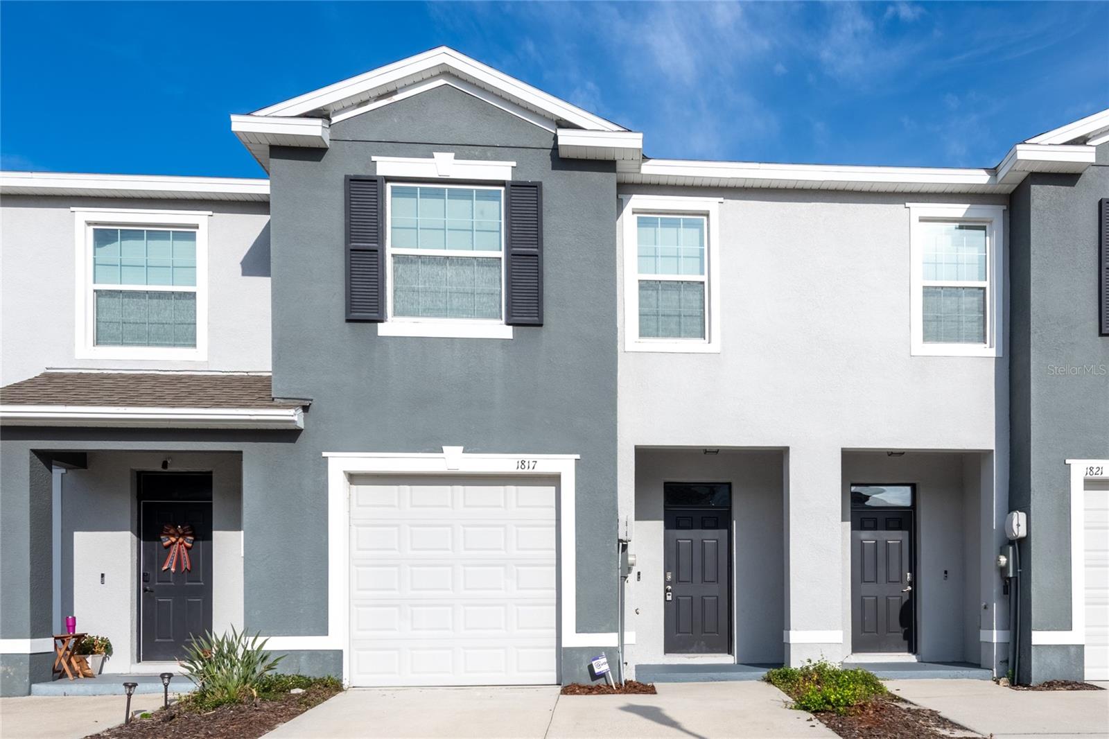 Virtually Staged. Welcome home to the highly coveted Union Park. Highly rated schools in all of Wesley Chapel. Sold AS-IS for Seller's Convenience. Seller lives in different state. This smart townhome has 3 brms/2.5 baths/one car garage. Two story block construction which is great for energy efficiency and sound proofing. Other features you don't want to miss; Camera doorbell, tile in wet areas, black appliances, washer and dryer, granite counters in kitchen with upgraded rectangle large sink with upgraded coil faucet, Large walk-in pantry, huge under stairs closet, covered lanai overlooking private backyard, double sinks in master bath, and garage door opener.  Priced to sell quickly, don't miss this opportunity. Internet and cable included in monthly HOA fees. Community offers resort style amenities such as 2 pools, fitness center, basketball, dog parks, playground and walking trails. Conveniently located to I-75, Wiregrass Mall, Tampa Premium Outlets, Krate at The Grove and so much more. Priced to sell quickly, don't miss this opportunity.