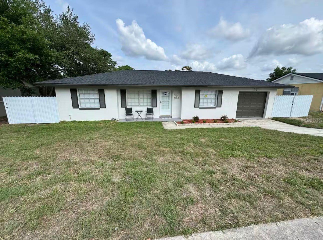 Welcome to 5120 Landover Blvd, Spring Hill, FL—a beautifully renovated, move-in-ready home that perfectly blends modern style with everyday comfort. This charming 2-bedroom, 2-bath residence features an open and inviting layout with updated laminate flooring throughout, a stunning kitchen complete with quartz countertops, wood cabinetry, an island, and brand-new appliances, as well as tastefully remodeled bathrooms with contemporary finishes. Recent major upgrades, including a new roof, new HVAC system, updated plumbing and electrical, and a new water heater, provide peace of mind for years to come. Enjoy relaxing in the screened porch, the convenience of a one-car garage, and the freedom of a property with no HOA. Situated on a spacious lot in a desirable Spring Hill location, this home offers exceptional value, modern upgrades, and a turnkey lifestyle for buyers seeking comfort, quality, and convenience.