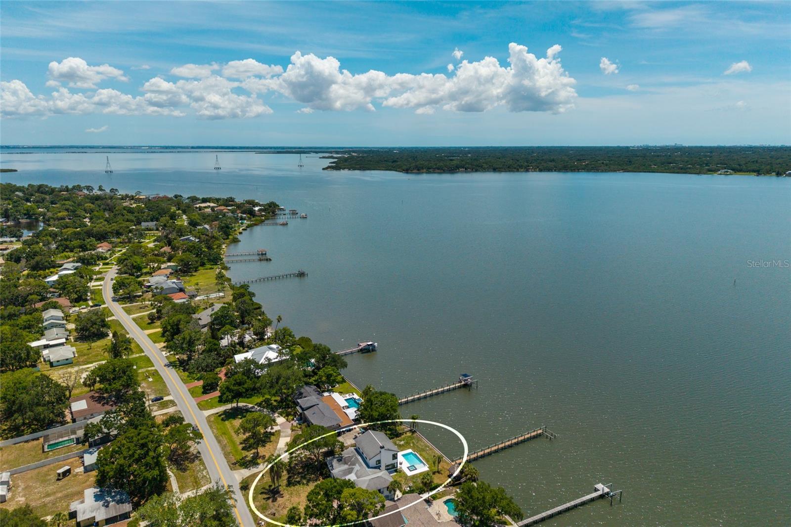 Unique opportunity to own a one-of-a-kind, beautiful property on Safety Harbour Bay with Direct access to Tampa Bay. Renovation by Herman Builders. The stunning modern completely updated home features: contemporary, Open and spacious Gourmet Chef's Kitchen High-end chef-quality appliances, with double ovens, fireplace Oversized Island  loads of cabinets, storage , the home has natural stone floors throughout. Full water views across the entire back of the home  large glass doors leading out to your beautiful contemporary pool. Boat Docs for keeping your boat  and easy access to Tampa Bay for the deep water fishing. The home features mother-in-law's quarters separate from the main home. With kitchenette, and private entrance . On the main floor, there are also three Guest or family  bedrooms a bonus space, laundry room , lots of storage. The Private owner's suite features a large spa bathroom fabulous walk-in closets with grand views of Safety Harbor bay. Conveniently located near airport and downtown with the best schools in Tampa.