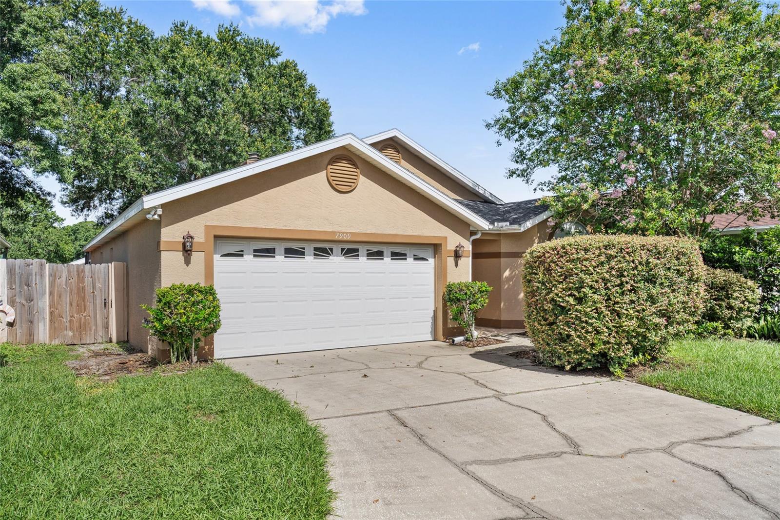Welcome to this beautifully maintained 3-bedroom, 2-bathroom home offering 1,628 square feet of comfortable living space, tucked away on a quiet cul-de-sac in the desirable Bradford Cove community of Orlando. Combining thoughtful updates, spacious indoor and outdoor living, and a prime location, this home is ready for its next owner. Step inside to discover a functional split floor plan featuring tile flooring throughout the main living areas with carpet in the bedrooms for added comfort. A stunning double-sided wood-burning fireplace, creates a warm and inviting focal point shared between the living room and family room—perfect for entertaining or relaxing on cozy evenings.
The kitchen and living spaces flow seamlessly to the impressive covered, screened-in patio that spans the entire width of the home. The fully fenced backyard offers exceptional privacy with no rear neighbors, providing a peaceful setting for pets, play, gardening, or enjoying Florida's beautiful weather. The property also features a private well for irrigation, with public water and sewer servicing the home. Major system updates provide peace of mind, with a new roof in 2022, brand new water heater in July of 2026 and a new A/C system installed in 2024! Located in the established Bradford Cove neighborhood, residents enjoy low HOA fees paid semi-annually, with access to the community pool and tennis courts through an additional membership and fee. Conveniently situated near UCF, Research Park, major employers, shopping, dining, SR-417, and Downtown Orlando, this home offers the perfect balance of privacy, community amenities, and everyday convenience. Don't miss the opportunity to make this charming Orlando home your own!