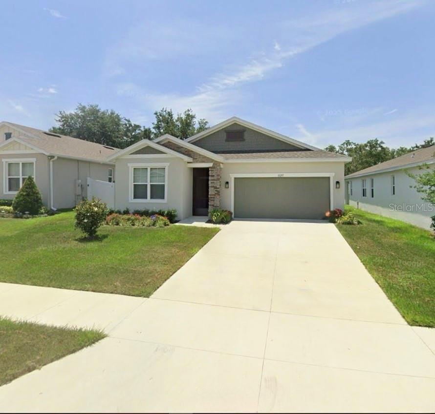 Welcome to this beautifully crafted 2023-built home in a prime location in Leesburg! This spacious home features in-law suite for multi-generational living at its finest. Come inside to discover a stunning kitchen, ample cabinetry, and plenty of space for entertaining or everyday living. The open layout flows seamlessly into the main living areas, creating a warm and inviting atmosphere. Each bedroom is generously sized, and the three full bathrooms are designed with both style and convenience in mind. The in-law suite features a kitchenette, washer and dryer hook-ups, private bathroom, and separate bedroom.  Close to all, including Lake-Sumter State College, Lake Square Mall, and Publix at Lake Village.