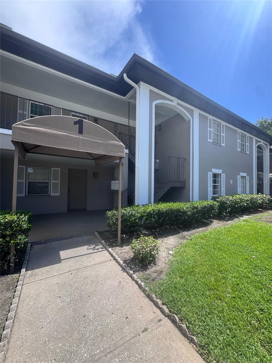 Nice 2nd floor freshly painted condo in clearwater's "bay oaks" community. This unit features new LVF with cork underlayment for premium noise reduction, Stainless steel appliances, granite countertops with high ceilings & comfortably sized living areas. Utility area/( for washer/dryer)on back porch. A/C unit  2023. Hot water tank 2025 .Conveniently located! near tri-city plaza with shopping, fitness center, supermarket & more just across the street. A quick tampa or st. Petersburg commute, & also just minutes westward to the gulf beaches! A one car carport space, and nearby guest parking