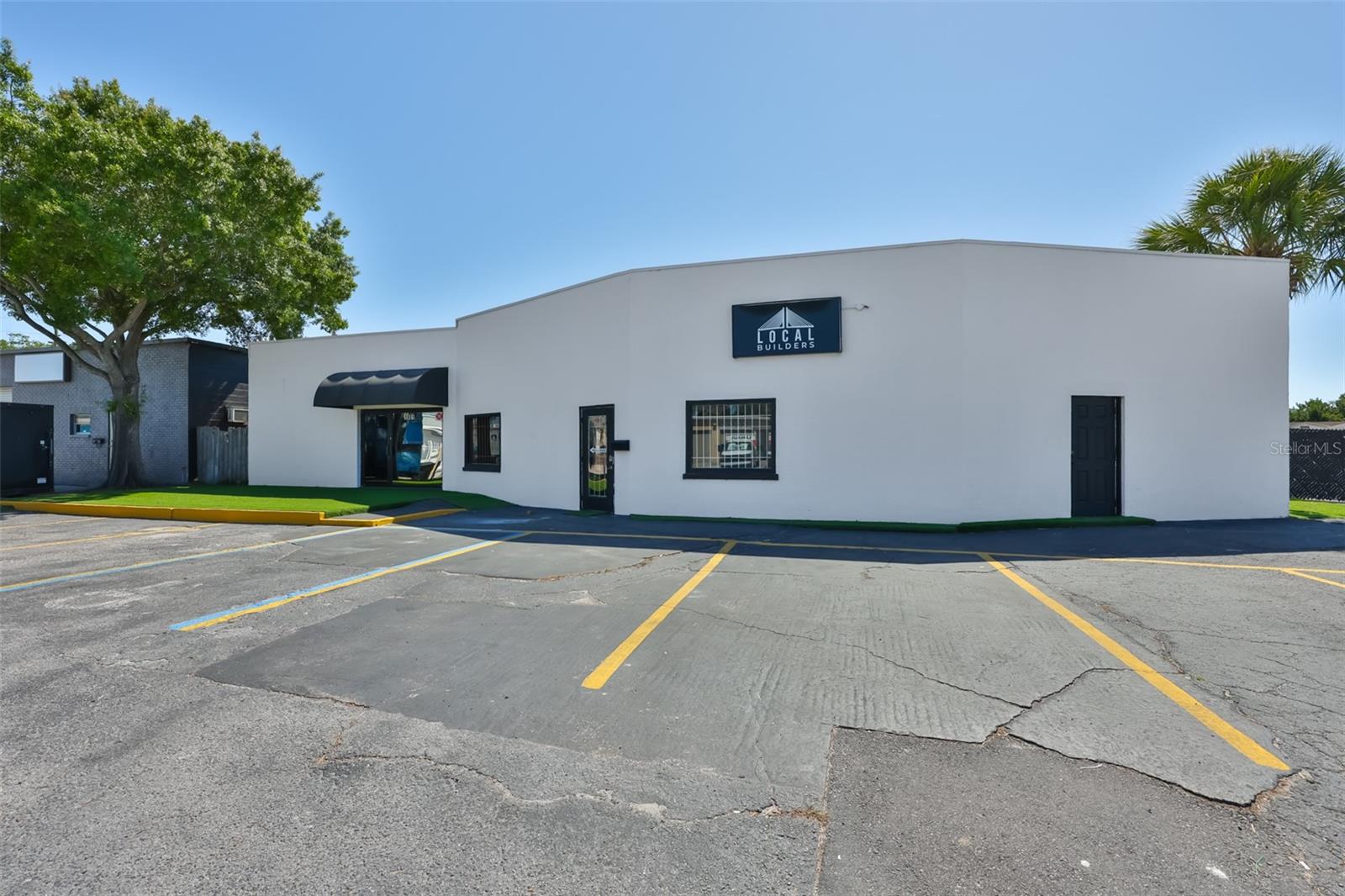 Position your business for success at 1801 28th Street N. a highly functional and exceptionally well-located commercial property in the heart of St. Petersburg. This versatile space offers a seamless blend of showroom, office, and warehouse capabilities ideal for owner-users seeking efficiency, flexibility, and a professional presence.  The property was recently updated.  A new roof was also installed in 2025, and a new air conditioner in 2024. Upon entry, you’re welcomed by an inviting showroom/reception area.  The layout flows into multiple private office areas, a spacious conference room, and expansive open areas that can be tailored to your business needs. 

The property also features a dedicated warehouse component with an overhead door, providing easy access for deliveries, storage, or traditional industrial use. Additional amenities such as multiple restrooms, a shower, kitchenette, and outdoor storage further enhance the functionality of the space.

Whether you're in distribution, service, showroom retail, or office-based operations with storage needs, this property offers a rare combination of visibility, adaptability, and convenience in a prime location.