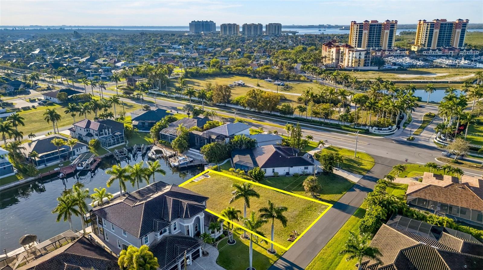Discover the perfect canvas for your Florida dream home at 5423 SW 17th Ave in beautiful Cape Coral! This exceptional Gulf access vacant lot offers boaters and fishing enthusiasts an unbeatable opportunity to live the ultimate waterfront lifestyle. With boating access and a quick ride to the river, you’ll enjoy effortless days on the water—whether you're cruising, casting a line, or heading out to the Gulf. A standout feature of this property is the existing concrete seawall and dock—an incredible value-add for future owners. Not only does this provide immediate waterfront usability, but it also saves significant time, cost, and permitting hassles when you’re ready to build. With these major improvements already in place, you can fast-track your construction plans and start enjoying your waterfront investment sooner. Ideally situated in a highly desirable area, this lot places you within walking distance of Cape Harbour, where you can enjoy waterfront dining, boutique shopping, and lively entertainment. You’re also just a short drive to Tarpon Point Marina for additional boating amenities, restaurants, and services. Plus, downtown Cape Coral is less than 10 minutes away, offering even more dining, shopping, and community events. Whether you're planning to build a seasonal retreat, a full-time residence, or invest in one of Cape Coral’s most sought-after boating communities, this lot offers the ideal combination of location, lifestyle, and long-term value. Don’t miss your chance to own a slice of paradise!