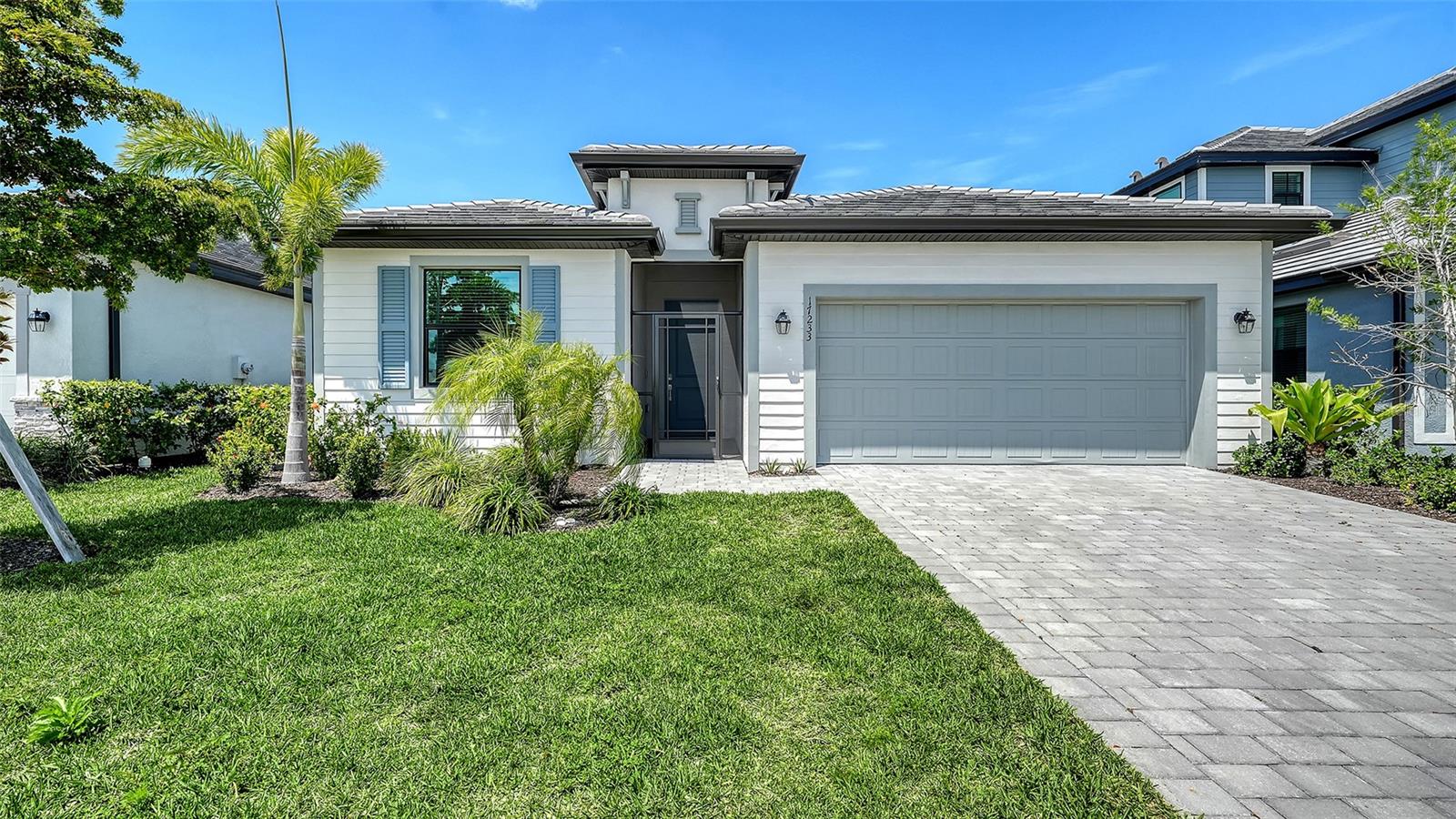 Welcome to your slice of Florida paradise in the highly desirable Lakespur community of Wellen Park! Built in 2024, with Hurricane Impact Windows and Doors, this beautifully maintained 3-bedroom, 3-bath with Bonus Room, residence offers over 2,200 square feet of thoughtfully designed living space, perfectly blending modern style with everyday comfort.
Step inside and immediately notice the stunning custom wall treatments that elevate the home’s interior, adding warmth, texture, and a designer touch throughout. The open-concept floor plan is ideal for both entertaining and daily living, with a spacious kitchen flowing seamlessly into the living and dining areas.

Wake up each morning to serene pond views and unwind in the evenings with peaceful water vistas right from your own backyard—creating the perfect backdrop for relaxation or outdoor gatherings.

The split-bedroom layout offers privacy and flexibility, with a generous primary suite and well-appointed secondary bedrooms, one being an en-suite, making it ideal for guests, family, or a home office setup.
Located in the sought-after Lakespur neighborhood, residents enjoy access to a resort-style community pool, playground and dog park, perfect for soaking up the Florida sunshine and embracing an active, social lifestyle. Even better, this is a golf cart-friendly community with easy access to shops, restaurants, and even Costco—all just a quick golf cart ride away!
Just minutes from the heart of Wellen Park, you’ll love the convenience of nearby shopping, dining, and entertainment, all while enjoying the tranquility of this charming, newer community.
Move-in ready, beautifully upgraded with blinds, window treatments and designer wall treatments, tastefully done—this is the one you’ve been waiting for!