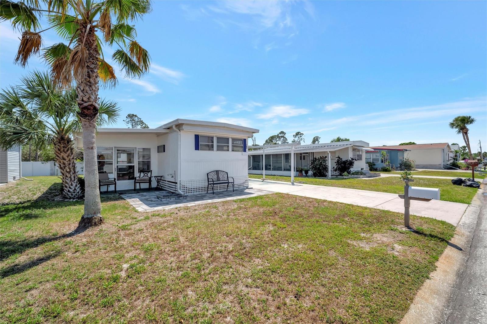 PRICE IMPROVEMENT! SELLER IS MOTIVATED!!! Caribbean Isles Residential Cooperative is a highly desired community to live in. This a single wide home with lots of charm. Nice eat in Kitchen and fully furnished for the single or couple looking for that Snowbird paradise. Has a large Primary Bedroom. The HVAC is near new. Caribbean Isles is a VERY Active 55+ community. From Shuffleboard and Bocce Ball to Corn Hole and Horseshoes. We welcome Golf Carts and several times a year we gather and decorate for Parades. The Clubhouse is used for Dances, Games, Dinners and more. In the Clubhouse we have a well-stocked Library and a large Craft Room. The Game Room has 3 Billiard Tables, 2 Poker Tables, a Bar Shuffleboard with 2 Dart Boards. Don't miss this opportunity come claim your piece of retirement paradise.