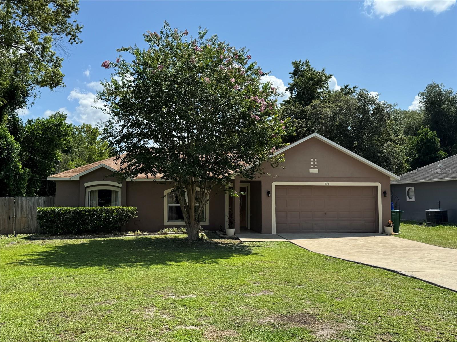 Location... Location... Location! NO HOA!  Welcome home to this move-in ready 4-bedroom, 2-bathroom gem situated on a spacious lot in the heart of Deltona. Conveniently located just minutes from I-4, you'll enjoy easy access to Orlando, Daytona Beach, shopping, dining, and all the everyday conveniences you need.
Designed with both comfort and entertaining in mind, this home features an inviting open floor plan with soaring vaulted ceilings that create a bright and spacious atmosphere. The kitchen flows seamlessly into the living room, making it the perfect gathering place for family and friends, while the separate formal dining room offers additional space for holiday meals, celebrations, or everyday dining.
Step outside and discover one of this home's standout features—a huge screened-in room overlooking the private, fully fenced backyard. Whether you're hosting weekend barbecues, family cookouts, watching the big game, or simply relaxing with your morning coffee, this incredible outdoor living space is made for year-round Florida living. The adjoining paved patio provides even more room for entertaining, while the oversized backyard offers endless possibilities for play, gardening, or creating your own backyard oasis. A large storage shed adds plenty of space for tools, lawn equipment, and extra storage.
This home has been thoughtfully updated for peace of mind with a new roof (2024), A/C (2018), fresh interior paint, new carpeting, and new toilets—making it truly move-in ready so you can start enjoying your new home from day one.
Outdoor enthusiasts will appreciate the close proximity to the Dewey O. Boster Sports Complex, Green Springs Park, Lyonia Preserve, and the Spring-to-Spring Trail, offering endless opportunities for recreation and enjoying Florida's natural beauty.
Whether you're searching for your first home, need extra space for a growing family, or are looking for a great investment opportunity, this property offers the perfect combination of location, space, updates, and value.
Don't miss your chance to own this beautiful move-in ready home—schedule your private showing today!