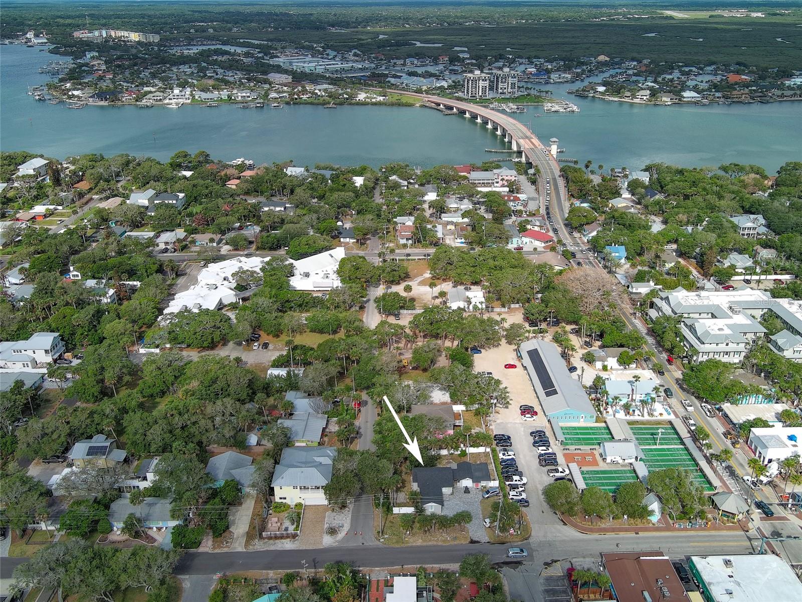 DEVELOPMENT POTENTIAL---SHORT -TERM RENTAL ZONE!...RETAIL...MU ZONING.....CORNER LOT.10,700 sq ft. ==OWNER FINANCING 30 YEAR /6.5%/ 10 YEAR NOTE. ........One of the last true multi-use properties just steps from iconic Flagler Ave! This rare opportunity offers unmatched flexibility with MU zoning that allows for multi-family, retail, commercial, or residential use—a prime setup for investors looking to capitalize in the heart of New Smyrna Beach....... City approved for three two-story, 2-bedroom, 2-bath townhomes- 
 Currently rented and generating positive income with immediate cash flow.
