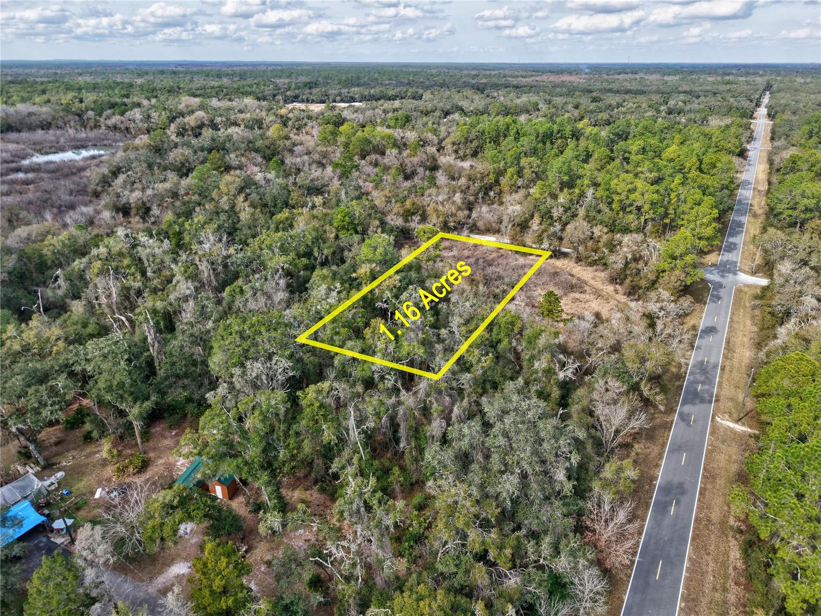 Partially Cleared 1.16 Acre lot in Webster,FL. Cheap lot in Hernando this Presents an exciting opportunity to build your dream home or mobile home in a serene and picturesque rural neighborhood. Ridge Manor is a tranquil community, with NO HOA. For those who need to commute or travel frequently, the property is conveniently located near major highways.