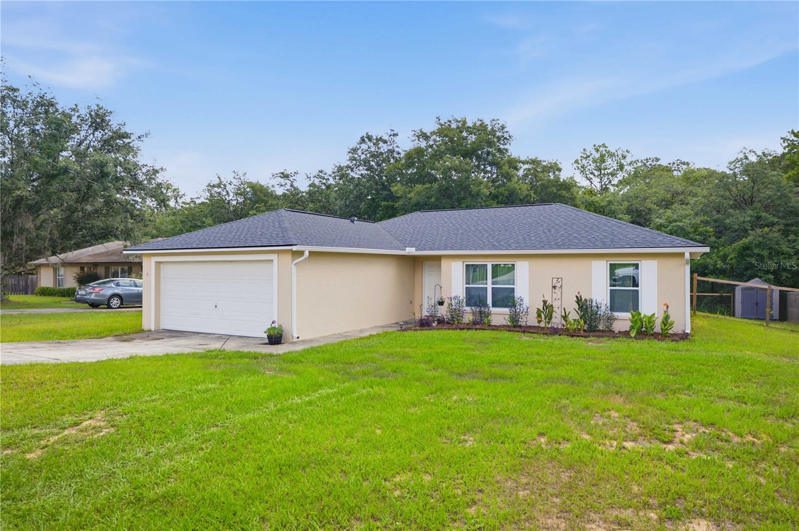Welcome home to this beautifully updated 3-bedroom, 2-bath residence in the heart of Silver Springs Shores! Featuring a desirable split-bedroom floor plan, 2-car garage, and a fully fenced backyard, this property offers the perfect combination of comfort, privacy, and functionality. Major updates have already been completed, including a new roof, new energy-efficient windows, new kitchen countertops, new appliances, and a whole-home water filtration system.

Enjoy added privacy and peaceful natural views as the property backs up to Marshall Swamp, providing a serene backdrop with no rear neighbors. The spacious yard is perfect for pets, play, gardening, or simply relaxing while taking in the natural surroundings.

Best of all, there's NO HOA, giving you the freedom to enjoy your property without additional fees or restrictions. Conveniently located near shopping, dining, schools, parks, and everyday amenities, this move-in-ready home is ideal for first-time buyer or growing families. With major updates already completed and a private setting that backs to nature, this home is one you won't want to miss. Schedule your private showing today!