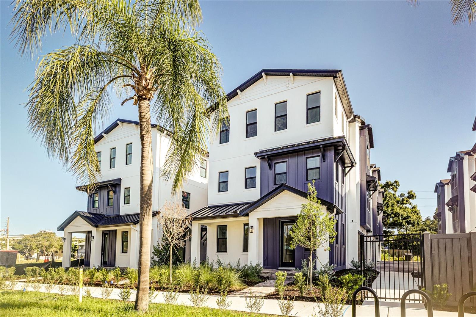 Discover modern luxury in the heart of St. Petersburg with Onyx+East’s newest townhome community, located in the charming and walkable Historic Kenwood neighborhood just steps from Central Avenue. These thoughtfully designed 3-bedroom, 3.5-bath luxury townhomes featuring high-end finishes, tall ceilings, open-concept living spaces, and a private balcony off the living and dining area—perfect for entertaining or relaxing outdoors. Enjoy the convenience of a two-car garage, smart home features, and energy-efficient + hurricane-rated construction, all within a lively, artsy neighborhood filled with local cafés, galleries, and nightlife. This unit has exclusive upgrades that include an extra bottom-floor porch area, a guest suite with a kitchenette, and a free-standing soaking tub in the primary bathroom! You'll rarely have to use a car if you live here; walk to restaurants, bars, grocery stores, and entertainment hotspots—all located within a few minute walk from your home. Whether you’re seeking a primary residence or a stylish retreat, this community offers the best of urban living in one of St. Pete’s most beloved historic districts. Units available now & pre-selling new build units—don’t miss your chance to live a vibrant life in a walkable community! Builder to provide $20K in closing costs with acceptable offer!