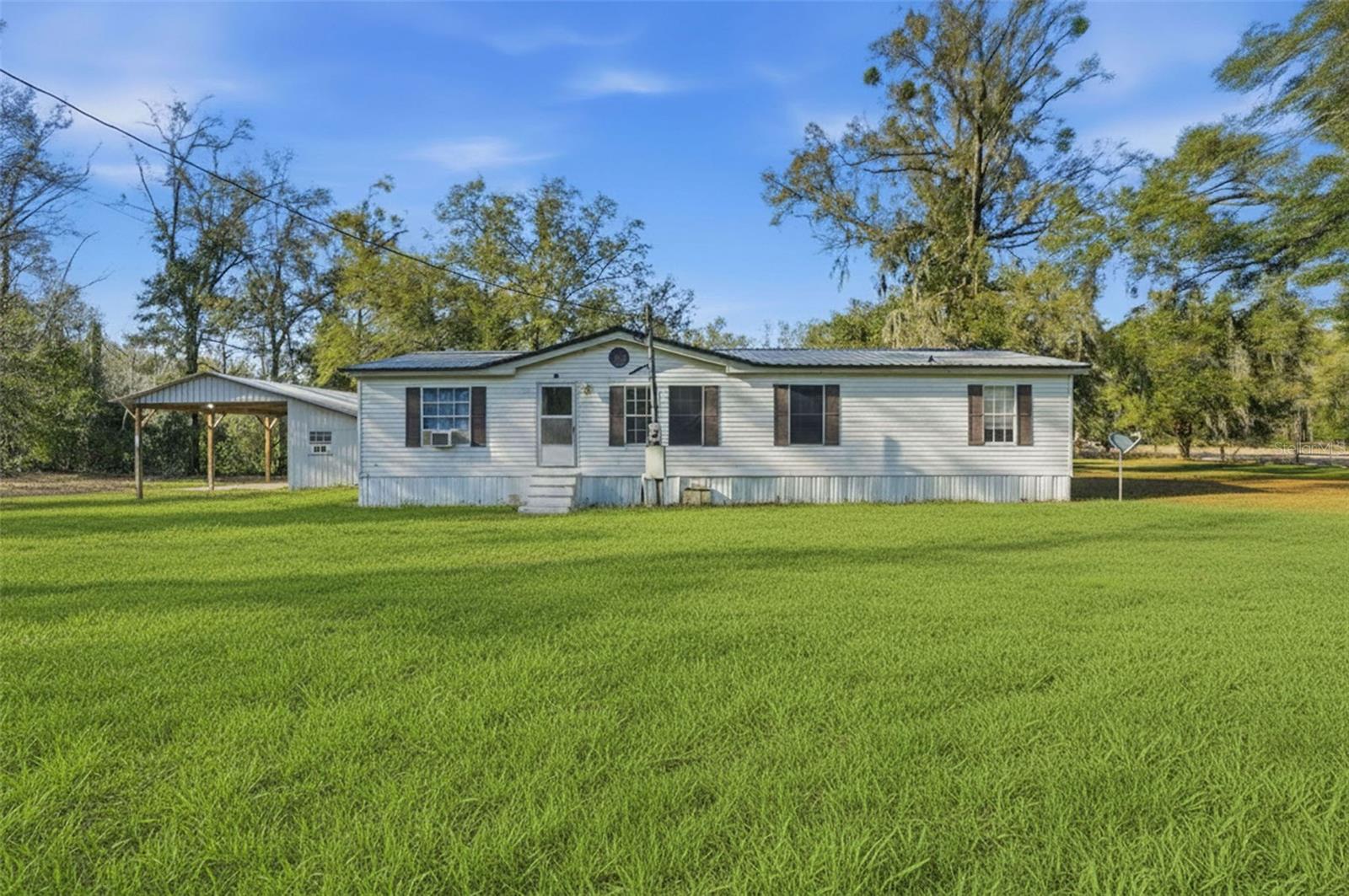 Virtually Staged. INCOME PRODUCING PROPERTY!!! 3 Bed 2 Bath on a little over 3 acres of land. NO FLOOD, NO HOA. Monthly rental income 1050. Month-to-month lease in case buyer wants to occupy the house or raise the rent. The grass is virtually staged