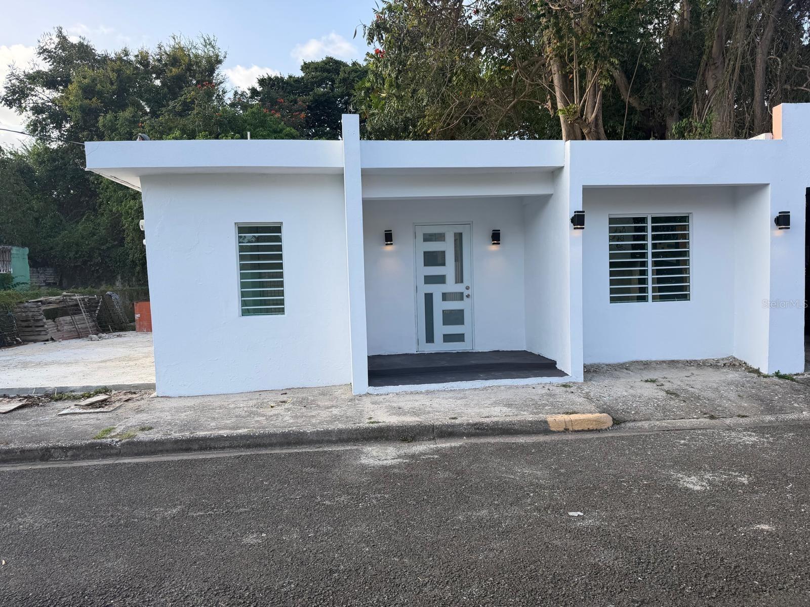 Renovated 4-bedroom, 2-bathroom concrete residence in the heart of Guayama. Offering approximately 978 square feet of living area, this single-level home features a functional floor plan, covered porch, and updated interior spaces. Convenient access to shopping, dining, recreational facilities, and major transportation routes. Flood Zone X. A great opportunity for owner-occupants or investors. All information is deemed reliable but not guaranteed and should be independently verified by buyers and their representatives.