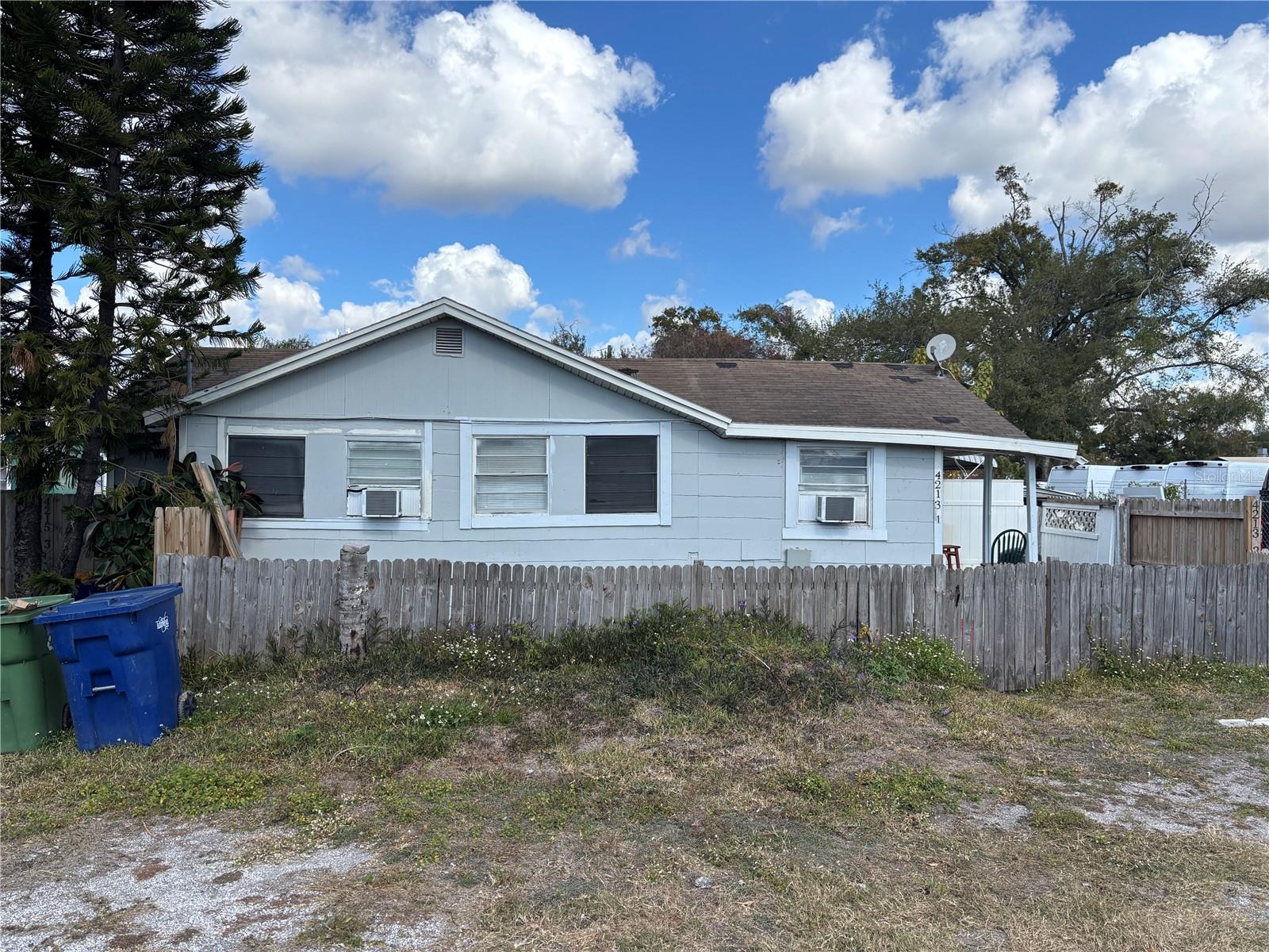 This well-positioned industrial property sits in the heart of Tampa's Airport warehousing district at 4213, 4215, and 4217 W. Cayuga St. The three contiguous parcels total ~0.60 acres, with frontage on W. Cayuga St. and back access to N. Thatcher Ave.
Zoned IG (Industrial General), it supports manufacturing, processing, assembly, warehousing, distribution, and related uses—offering maximum flexibility for investors or owner-operators.
Currently income-producing with 5 long-term rented units, it's a turn-key cash-flow asset. The front structure at 4215 was removed after a fire, revealing the site's full scale and development potential.
Just minutes from Tampa International Airport, Dale Mabry Highway, and the Suncoast Parkway, it's surrounded by high-traffic activity. A busy car rental company across the street leases the adjacent lot for fleet parking and could expand here; nearby dealerships may also seek vehicle storage space.
City water and sewer are available. Ideal for steady income, redevelopment, or strategic land near the airport.
Drive by anytime, but please do not walk the property or disturb tenants.