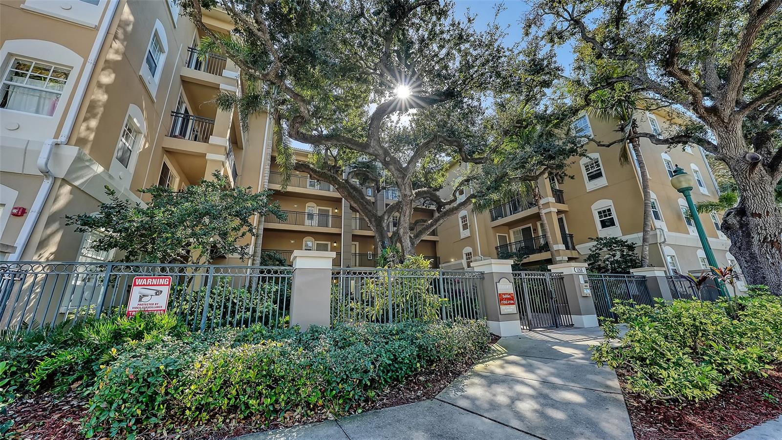 Welcome home to this top-floor end-unit residence offering a private, treehouse-style setting in a desirable low-rise condominium in the heart of downtown Sarasota. This stylish mid-century modern home features a partial bay view, abundant natural light, and a completely remodeled kitchen and utility room. Thoughtfully updated with a new HVAC system, water heater, stainless steel appliances, ceiling fans and custom window treatments, the property is move-in ready and includes tasteful, turnkey furnishings. Ideally just near Pioneer Park with open green space, recreational paths and tennis courts, and within a short distance to Bay Park, downtown dining, shopping, arts and the waterfront. An exceptional opportunity for full-time living, a seasonal retreat or investment ownership. MOTIVTED SELLER, BRING OFFERS!