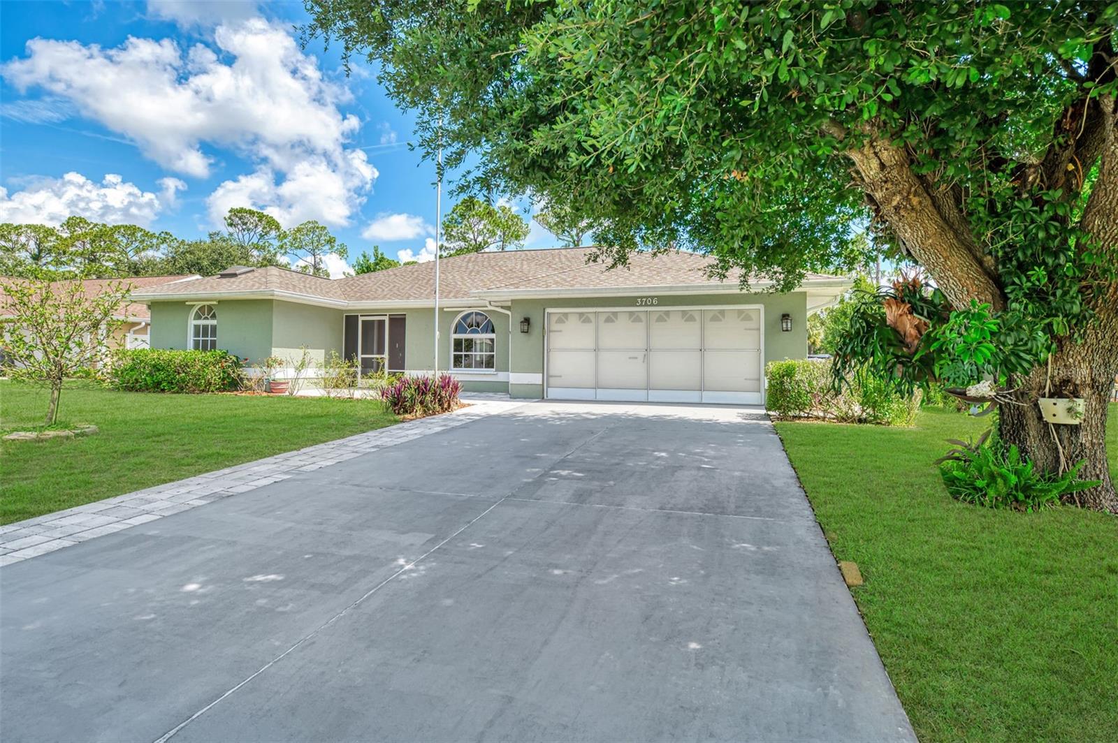 Welcome to your own private Florida retreat!
This spacious 3 bedroom, 2 bath pool home offers the perfect blend of comfort, functionality, and outdoor living in one of North Port's most desirable locations.
Step through the elegant double door entry into a bright, inviting living room featuring an electric fireplace that creates a warm focal point for relaxing evenings or entertaining guests. Sliding glass doors open to the screened pool area, filling the home with natural light and creating a seamless connection between indoor and outdoor living. An additional family room provides flexible space for gathering, a media room, or everyday living.
The beautifully appointed kitchen is designed to impress with rich wood cabinetry, granite countertops, stainless steel appliances, and generous counter space, making meal preparation and entertaining effortless.
The spacious primary suite offers a peaceful retreat with a private en-suite bath, while the split bedroom floor plan provides privacy and comfort for family members or overnight guests. The oversized third bedroom offers exceptional versatility, making it an ideal space for multigenerational living, a private mother-in-law suite, a home office, game room, or an additional entertaining area.
Step outside to your own backyard oasis. Enjoy year-round swimming in the solar-heated saltwater pool, then unwind in the above-ground saltwater spa. The private backyard overlooks a tranquil freshwater canal and features a dock perfect for enjoying your morning coffee, fishing, watching local wildlife, or simply taking in the peaceful water views.
Additional features include a storage shed for tools and lawn equipment, as well as a screened garage door that adds versatility for hobbies, projects, or expanded entertaining space.
Conveniently located just minutes from I-75, shopping, dining, parks, and the new Sarasota Memorial Hospital campus currently under construction, this home combines everyday convenience with an exceptional Florida lifestyle.
Offering spacious living areas, quality finishes, abundant storage, and a serene waterfront setting, this move-in-ready home is the perfect place to enjoy everything Southwest Florida has to offer.