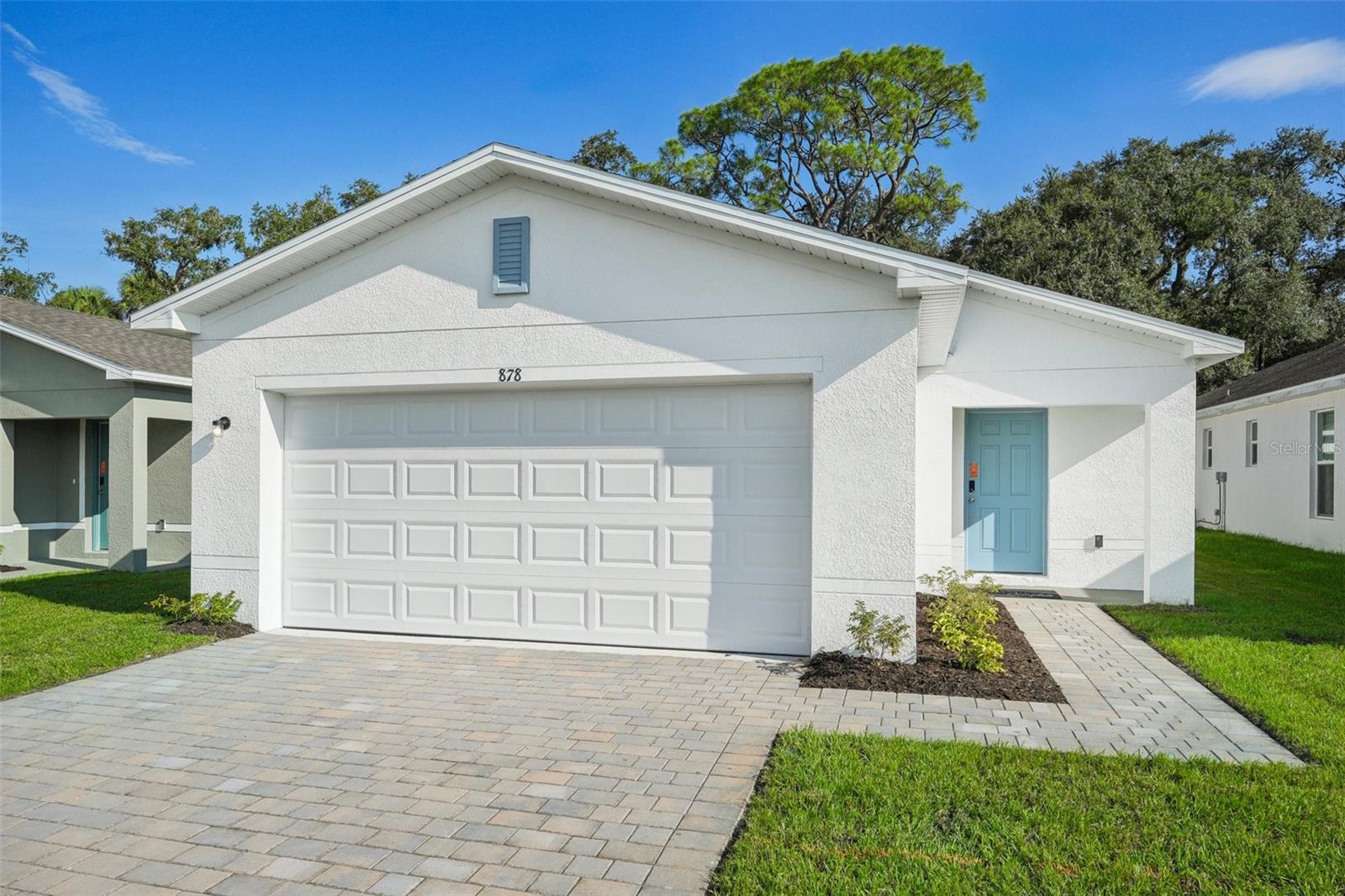 You will love this DELIGHTFUL NEW Single-Story Home in the Eagle Hammock Community! The desirable Sanibel Plan boasts an open design encompassing the Living, Dining, and Kitchen spaces. The Kitchen features gorgeous cabinets, quartz countertops, and Stainless-Steel Steel Appliances (Including Range with a Microwave hood and Dishwasher). In addition, the primary suite has a private bath with dual vanity sinks and a walk-in closet. This Home also includes 2 more bedrooms and a full secondary bath. This desirable plan also comes complete with a 2-car garage. Conveniently located near Winter Haven and Lakeland—approximately less than an hour from Orlando and Tampa—Eagle Hammock offers easy access to restaurants, shopping, and entertainment. You’ll also have amazing community amenities (Clubhouse, Resort-Style Pool, Playground and Walking Trails) and be within walking distance of the local elementary and high schools.