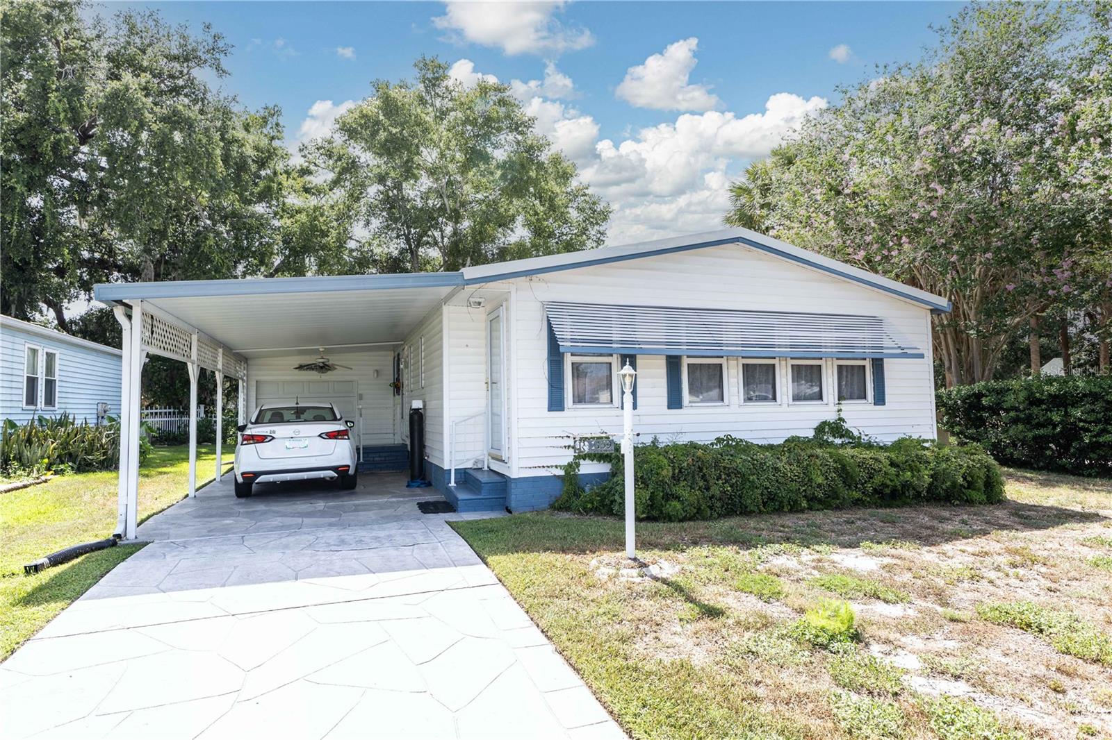 LADY LAKE ORANGE BLOSSOM GARDENS UNIT 13 - Residential Lease