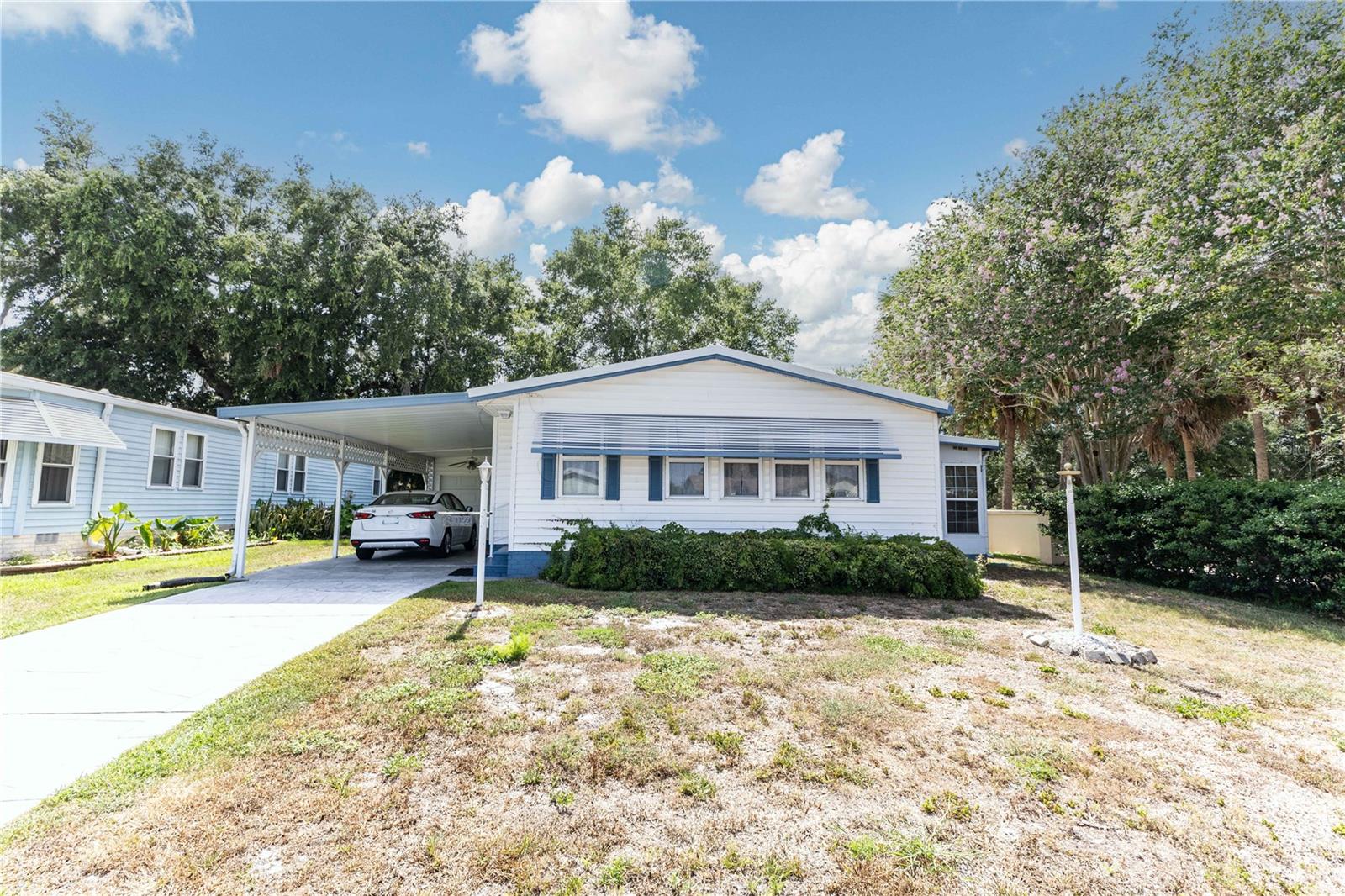 LADY LAKE ORANGE BLOSSOM GARDENS UNIT 13 - Residential Lease
