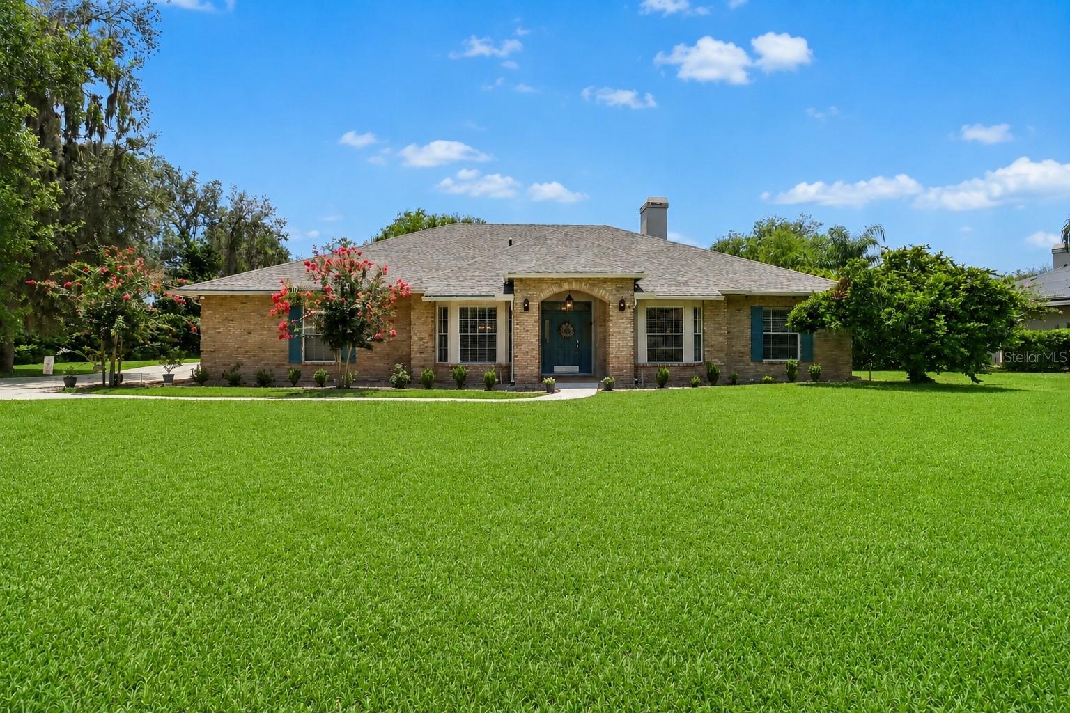 PEACEFUL COUNTRY LIVING...WITHOUT GIVING UP THE CONVENIENCES OF THE CITY!

Tucked away in the quiet, intimate gated community of Regal Cove, this thoughtfully updated home offers the perfect balance of privacy, comfort, and convenience. Located just minutes from Historic Downtown Kissimmee, Highway 192, the Florida Turnpike, NeoCity, Lake Nona Medical City, Orlando International Airport, shopping, dining, and everyday conveniences, you'll enjoy a peaceful setting without sacrificing accessibility.

Just outside the community entrance, a local fish camp, marina, and public boat ramp provide immediate access to WEST LAKE TOHO, a 23,000-ACRE FRESHWATER LAKE renowned for world-class bass fishing, boating, and professional tournaments. Spend the day on the water, then return home to the mature oak trees, spacious homesites, and peaceful surroundings that make Regal Cove one of Central Florida's best-kept secrets. 

This well-designed 4-bedroom, 3-bath home features a desirable split floor plan, with the private owner's suite separated from the three additional bedrooms. Two bedrooms share a Jack-and-Jill bath, while the fourth enjoys its own en-suite bath, making it ideal for guests, extended family, or multigenerational living.

Designed for comfortable everyday living, the spacious kitchen offers abundant cabinetry, stainless steel appliances, generous counter space, a breakfast bar, and opens seamlessly to the family room and dining area. Multiple French doors lead to the outdoor living spaces, while a dedicated home office provides the perfect work-from-home setting.

A classic floor-to-ceiling brick fireplace with built-in bookcases anchors the inviting family room. The private owner's suite features a beautifully renovated bath with dual vanities, a freestanding soaking tub, and a ZERO-THRESHOLD WALK-IN SHOWER.

Outdoor living is a highlight with a BRAND-NEW SCREENED FLORIDA ROOM featuring porcelain tile flooring and a covered lanai overlooking the backyard. Situated on JUST UNDER A HALF-ACRE, the property offers plenty of room to build the POOL OF YOUR DREAMS while still providing generous green space for entertaining, gardening, pets, or simply enjoying the peaceful Florida landscape.

Additional improvements include a ROOF AND DUAL-ZONE HVAC SYSTEMS APPROXIMATELY FOUR YEARS OLD, an irrigation system, and an oversized two-car garage.

Whether you're spending weekends on Lake Toho, relaxing in your private backyard, or enjoying the convenience of nearby Lake Nona, NeoCity, Orlando International Airport, and Central Florida's renowned attractions, opportunities like this are rare. Schedule your private showing today!